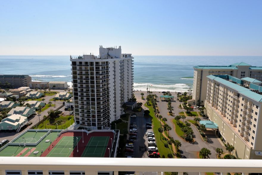 SEE FOR YOURSELF - you will love this very nice two bedroom, two bath condo with beautiful direct views of the gulf. Located on the desirable 18th floor of Building I, this unit has been updated with coastal colors & dcor & is well-suited for your gulf-side vacations or for a vacation rental. It is now on a guaranteed rental program through March 2016 that pays the owners a NET of approximately $1600.00 per month year-round per the seller. Only a short walk to the deeded beach & beautiful gulf waters, Ariel Dunes is a signature complex with two towers located in the gated community of Seascape Resort. Amenities include 2000 feet of deeded white sand beach, three large pools, the Cabana Cafe, golf, tennis, fitness room, & a conference center. Conveniently located near shopping,