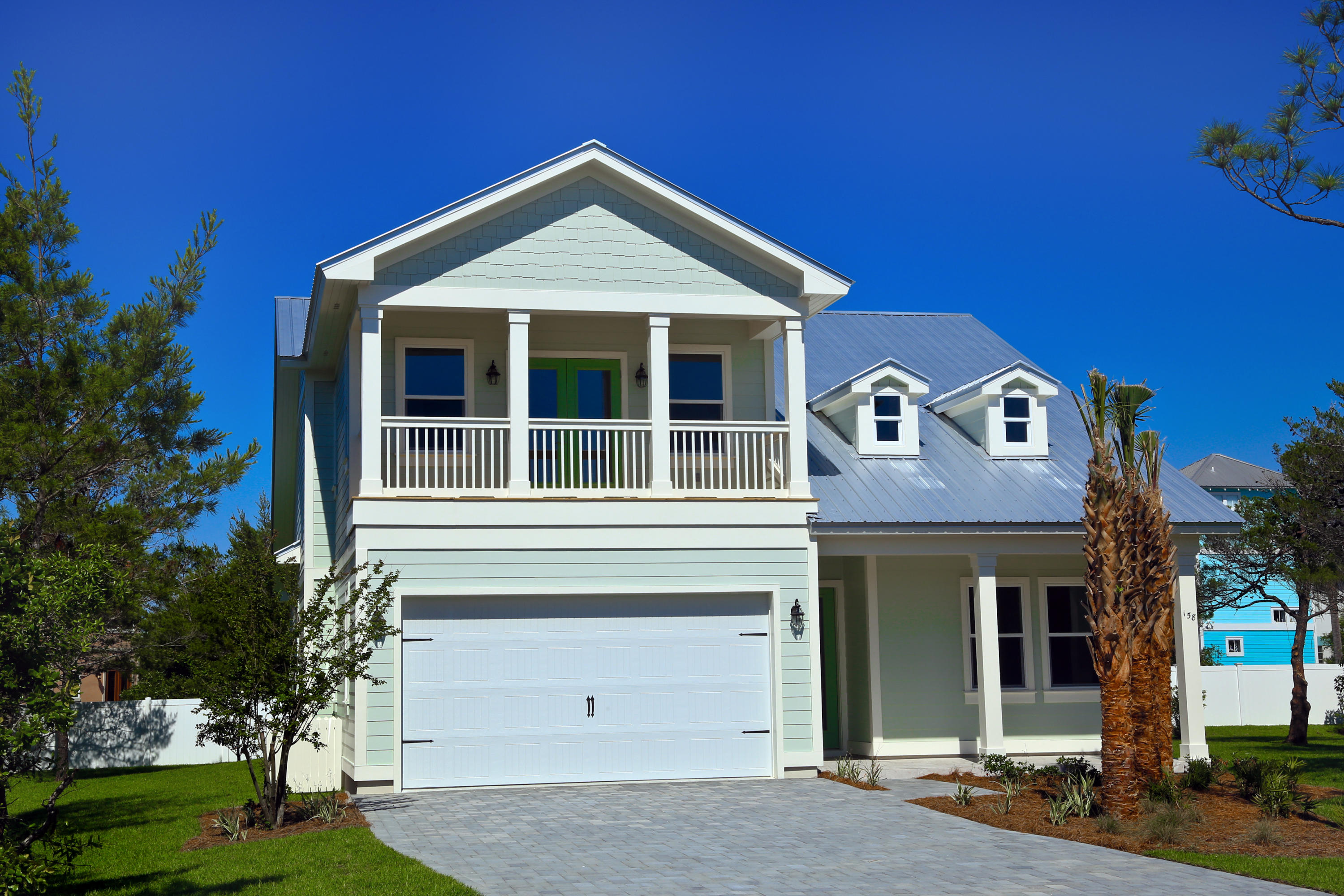Check out the virtual tour!https://my.matterport.com/show/?m=buPo4r3Dtgh&brand=0 New 4 bedroom home with just under 2,300 sq ft. in secure gated subdivision that is walking distance to the Gulf. The great room has 18 ft. ceilings. Home newly completed. There is a beautiful Community Pool and Clubhouse and cobblestone roads make this a truly charming new neighborhood.