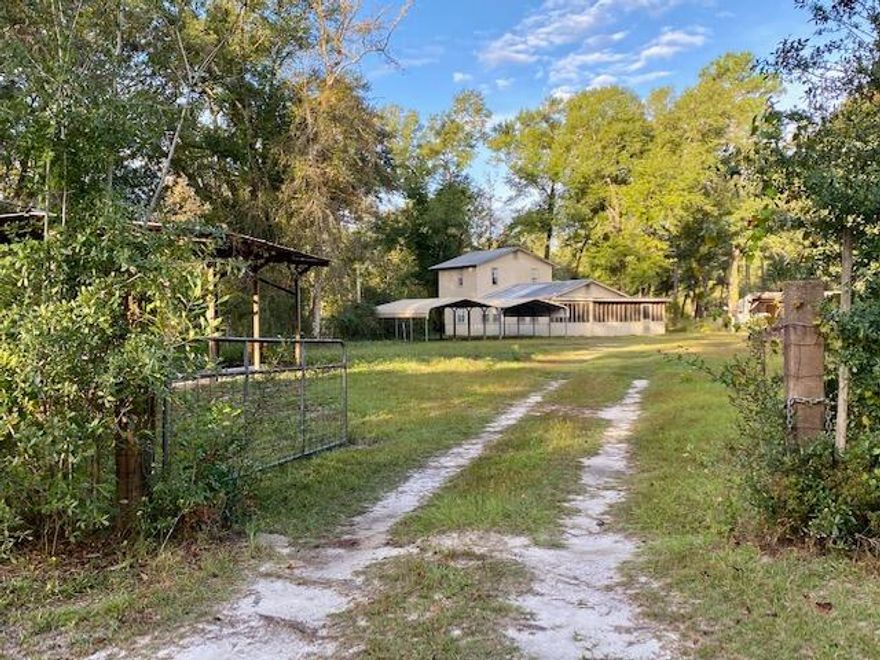 Enjoy the quiet life in this two-story well built 3 bdrm block home sitting on 0.84 acres. Kitchen counters and sink have been installed and this home should now qualify for Conventional Financing. This property would be perfect for a first time home buyer, a weekend getaway or for the fixer upper. The bonus room could easily be converted into a 4th bdrm or office. Please note the following upgrades: a tankless gas water heater, LVP floors with moisture barrier and padding, ceiling fans, newly painted kitchen cabinets and a whole house water filter system. Don't forget the RV, there is covered parking with hook ups. Plenty of room in the yard to add a pool, garage, or workshop. Only 6 miles from the Black Creek Bridge boat ramp. Zoned for Freeport Schools. Motivated Seller.