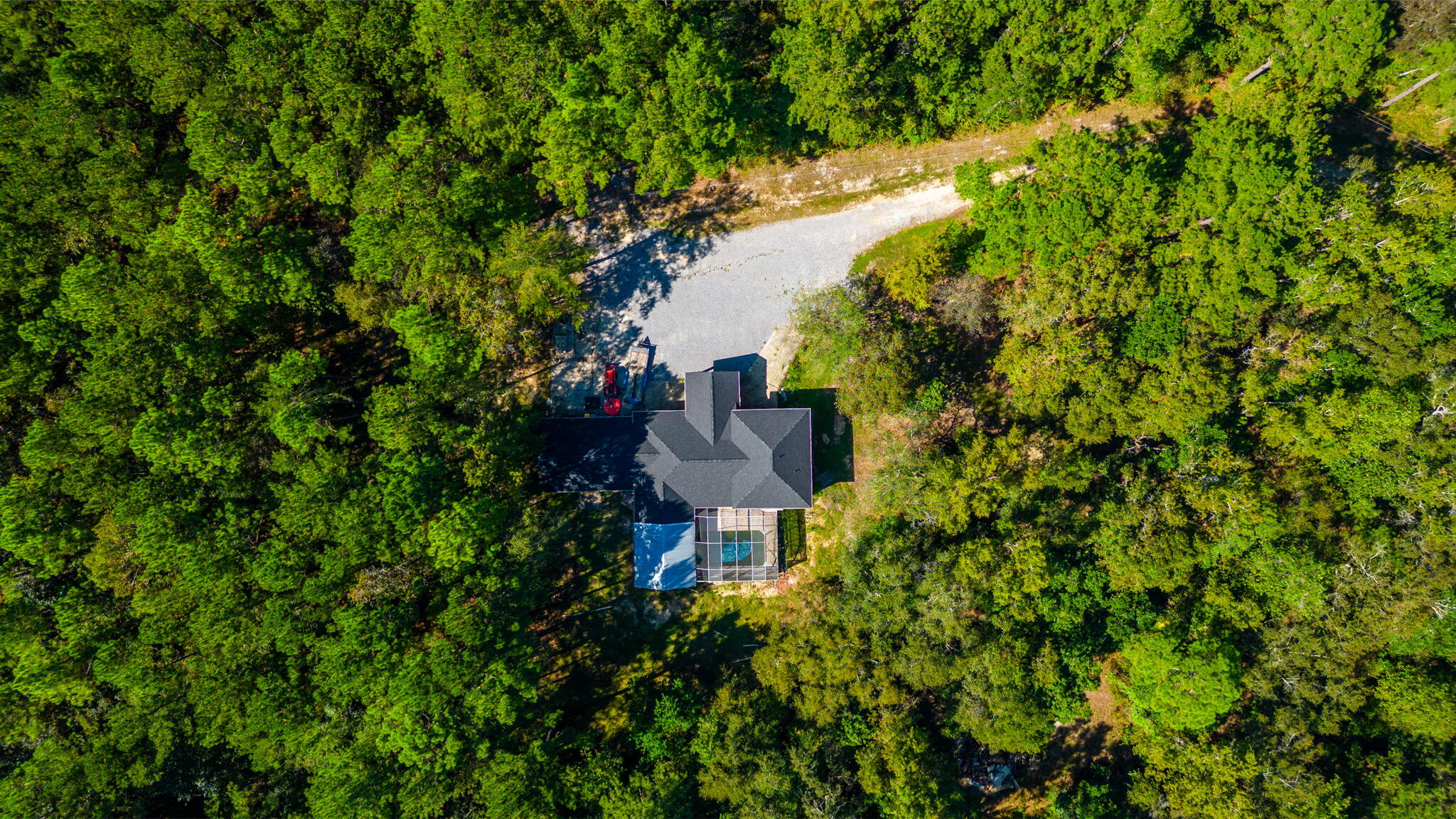 New Roof!  New HVAC x2!INVESTORS!  Renovations have started on this home but plans have changed and it's time for the current owners to move on.  This potential flip has an ARV of ~$700k. HOME OWNERS!  If you are ready to take on a project, there's a ton of potential here in this secluded little spot across from the Blackwater Golf Course.  Current land use is Residential, Future land use is Commercial.  Property is 5+/- Acres and can be combined with adjoining 7.5 acres. MLS 942243Driveway access will be a deeded easement if necessary.