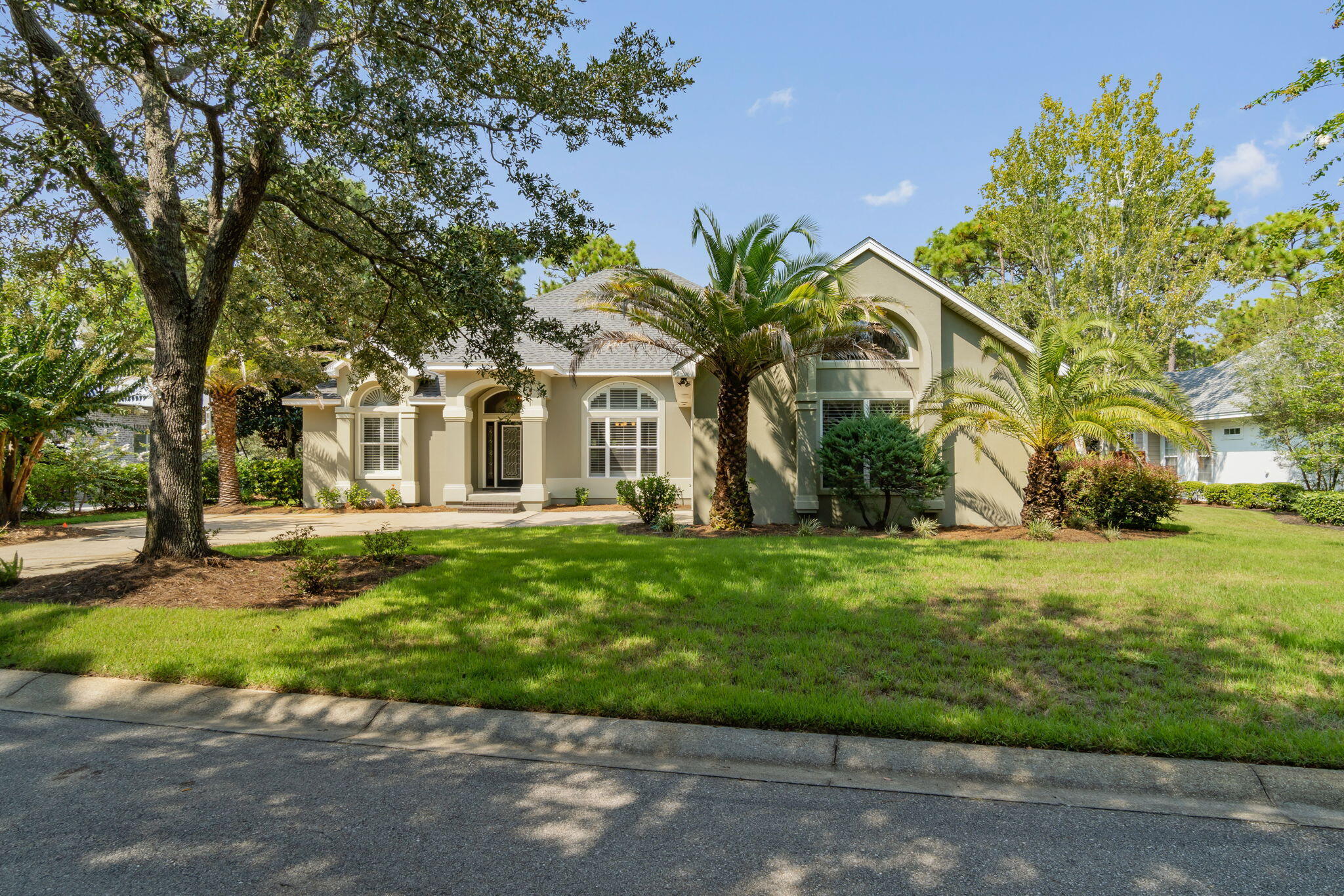 Enter the gated, waterfront community of Botany Bayou and pass lush landscapes on your way to 167 Botany Boulevard.  This 3,761 square foot, two story custom built home has so much to offer.  On the first floor, to the left of the living room is an office/bedroom, with adjacent powder room.   Continue to the master bedroom suite with two large hallway closets leading to the master bath featuring a jetted soaking tub, walk-in shower and double vanities. The living room/dining room offers an open floor plan, high tray ceilings, electric fireplace, and plantation shutters.  French doors in the living room open to an enclosed Florida room and back deck.  Directly behind the property is a nature preserve, offering a relaxing and private setting.  The kitchen offers plenty of cabinet