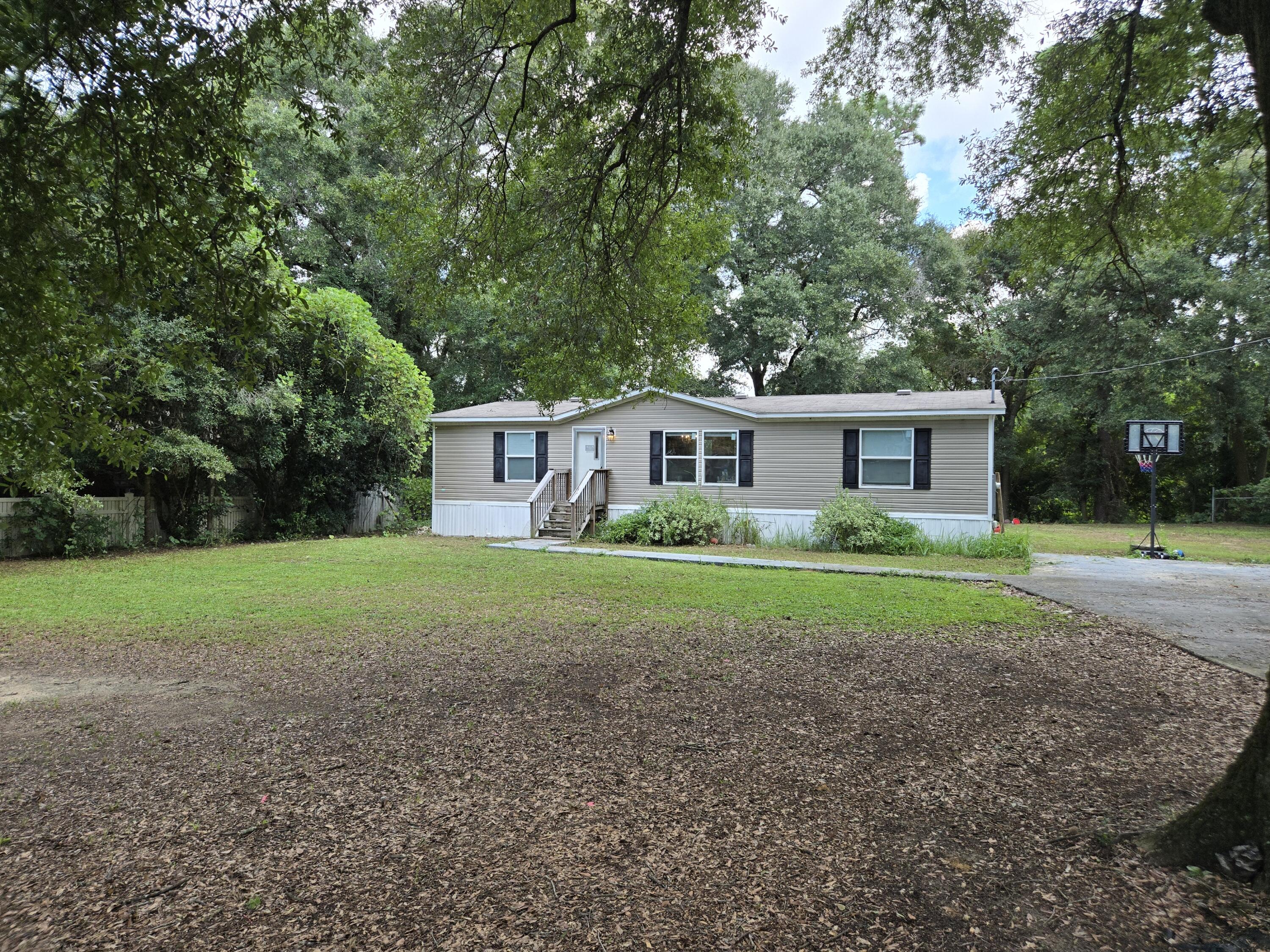 GREAT BUY IN CRESTVIEW FLORIDA.The home offers 3 bedrooms 2 baths, a large living area, and an abundance of outdoor space. Close to Downtown Crestview and all the great amenities Crestview has to offer.