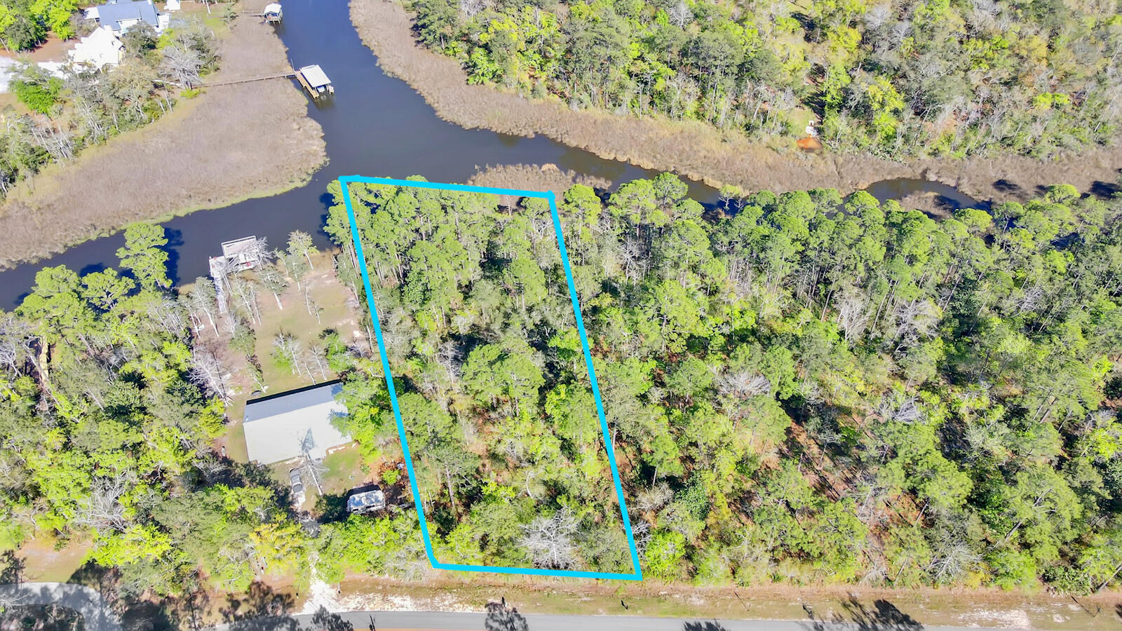 Nestled on Bay Grove Road, this vacant waterfront lot offers a serene and picturesque view of the bayou. Its prime location provides easy access to the water, making it a perfect spot for water sports enthusiasts and those seeking the many benefits of waterfront living. Whether it's boating, fishing, or simply enjoying the view, this lot offers the ideal setting to experience all that waterfront living has to offer. With its highly sought-after location, this lot represents a rare opportunity to create the home of your dreams. Don't miss out on this once-in-a-lifetime chance to own a stunning piece of waterfront property.
