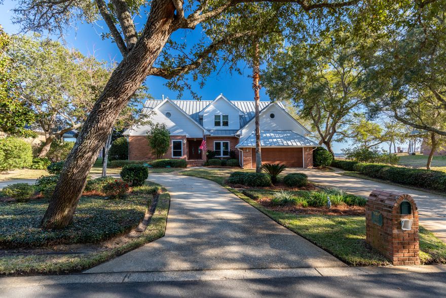 Experience Amazing views from this Beautiful Waterfront Estate on Shalimar Pointe. This impressive home towers over the Choctawhatchee Bay and is perfect for enjoying the sun rise , dolphins jumping, or redfish swimming. The covered dock and lift means that you are only minutes from fun on the water or dinner at your favorite restaurant. Unwind and relax at your very own bayside fire-pit and swimming pool. At more than 5000 square feet, this open and spacious floorplan was has a room for everything.. The master suite has two large closets, bathroom, and flex space. There is a large bonus room that is currently used for fitness but could be a hobby room, nursery, etc. The kitchen is a chefs dream with gas range and lots of cabinet and countertop space. You will be