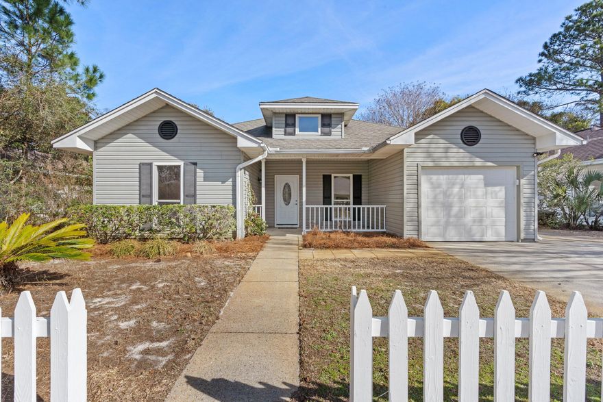 New Metal Roof as of 6/7/2024  Lovely home in charming residential enclave minutes away from beautiful beach and bay park.  New LVP flooring, newly painted interiors, quartz kitchen counters and some new windows and glass doors.  Americana deluxe! . The fenced backyard with a patio offers a private retreat for outdoor enjoyment. Conveniently located near pristine beaches and a variety of amenities, this is an ideal opportunity to experience the best of coastal living in Miramar Beach.
