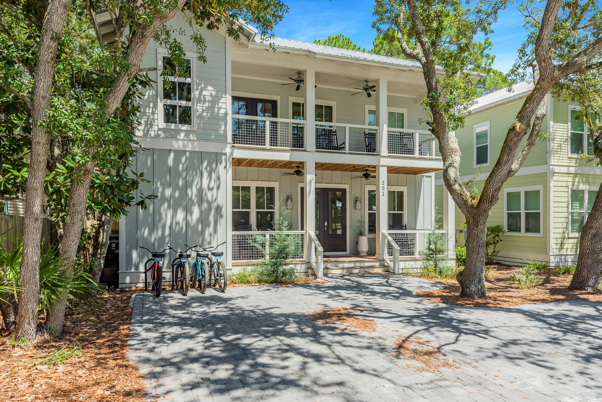 Charming quintessential Grayton Beach abode offering everything that encompasses the Grayton lifestyle.  Craftsman architecture showcasing custom trim-work, walnut flooring, wood shiplap accent walls and quartz countertops exemplify this 30A property. 201 Defuniak Street features 4 bedrooms, 3 full bathrooms, 1 half bathroom, a private pool and outstanding outdoor living. Enjoy relaxing afternoons on one of the many porches found on the home. Situated in the heart of 30A and steps to the sugar-white sands; luxury dining, high-end shopping and world-class entertainment is a walk away. Offered fully furnished, this cottage creates the perfect second home, permanent residence or investment property.  Opportunities in Grayton are rare, do not miss the chance to make this your paradise!