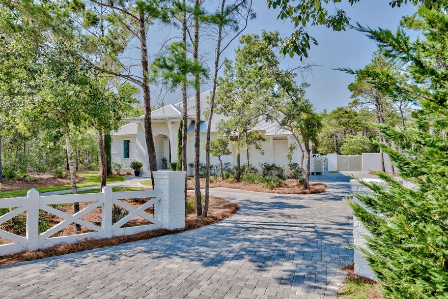 Look no further for your private oasis, than in The Pines of Blue Mountain Beach. 9 East Surfside Drive is your idyllic one-story home for the sophisticated eye. Pulling into the drive will make you feel right at home and sets the tone for the property.The foyer greets you and your guest with elegance, before walking into the main living hall where you are captivated with light and a very large open living space. The main living overlooks a beautiful Grecian pool and our protected state forest.The private master bedroom brings peace and refuge at the end of day. No detail was left un-turned when planning the separate his and her bathroom, not to mention retreating to the outdoor shower just off his master bath.Offering four bedrooms plus a large office provides plenty of space for