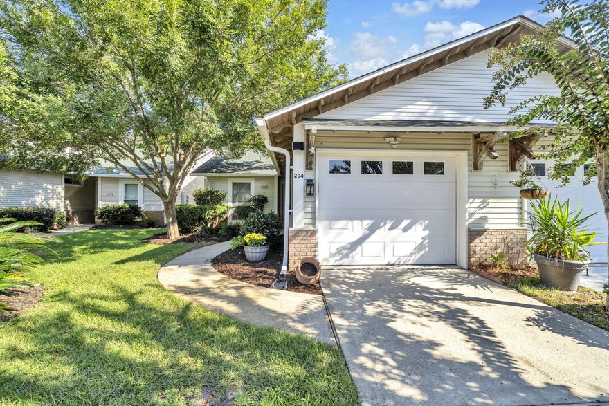 Welcome to 204 Via Largo, a beautifully maintained single-level home offering 3 bedrooms and 2 bathrooms in the desirable Escada neighborhood of Santa Rosa Beach. Inside, the open layout creates an easy flow between the living, dining, and kitchen spaces. Natural light pours in through large windows and doors, highlighting the thoughtful details, including granite countertops and a built-in mini bar that make the kitchen ideal for everyday living or entertaining. The primary suite provides a spacious retreat with its ensuite bath and walk-in closet, while two additional bedrooms and a full bath complete the floor plan.Step outside to a covered patio overlooking a private backyard--perfect for relaxing or enjoying outdoor gatherings. The Escada community HOA enhances the lifestyle with a swimming pool, yard maintenance included, and direct access to a scenic trail that leads to the renowned beaches of 30A. Blending comfort, style, and coastal living, this home is a standout opportunity in a sought-after location.
