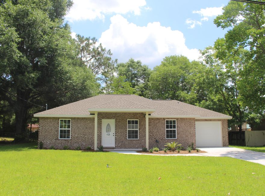 BRAND NEW CONSTRUCTION AT THIS AFFORDABLE PRICE!! Wow...this super cute 3 bd/2 ba home is situated on a level lot and features a brick front with low-maintenance vinyl siding on the sides and rear. It is sure to please with flooring consisting of laminate hardwood, tile and carpet, espresso-colored cabinetry and coordinating laminate countertops. Stainless steel appliances to include a stove/oven and dishwasher. Beautiful interior doors, cased windows, indoor laundry, automatic garage door opener, attic pull down stairs, manibloc plumbing system. Great level backyard!! Lot dimensions are approximate; room measurements taken from building plan; buyer to verify school zones and all areas of importance. Listing agent is related to sellers; seller holds an inactive FL real estate license.