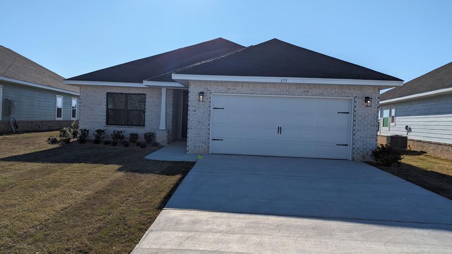 Builder is offering, while supply lasts: (a) 4.99% fixed rate financing for qualifying VA & FHA buyers + (b) $10K flex cash to use at buyer's discretion to add features to the home (e.g. blinds, fridge, screen enclosure, additional ceiling fans) or apply to prepaids, HOA costs or other closing costs.  Full brick home, located 20 minutes from Blue Mountain Beach!  Flood Zone X.  Open concept, 3 bedroom, 2 bath plan with LVP flooring throughout, no carpet.  Minimum 9' ceiling height with trey in M.Bedroom and soaring ceiling in living room.  8' entry doors, large rear covered patio, Master bedroom is 14 x 22.  Generous master closet, Shower w/enclosure in M. Bath with separate garden tub, quartz counter tops, undermount sinks, lever-type door handles, irrigation with well & pump.