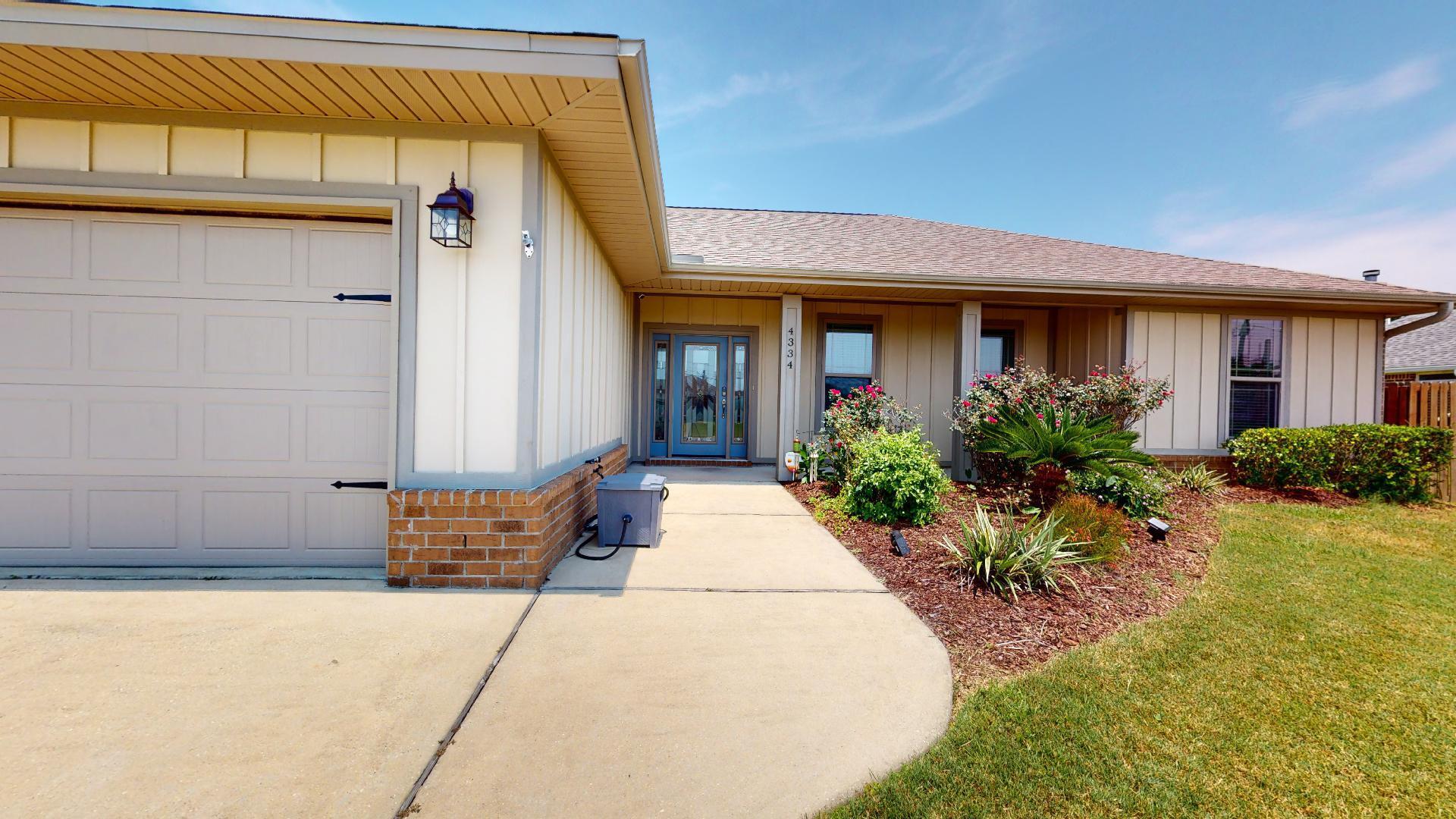 Beautiful home, centrally located between Pensacola and Navarre. This home features 9' ceilings, crown molding, tile floor in the main area, carpet in bedrooms, granite counter tops, island with breakfast bar, recessed lighting, tile walk in shower in primary bath and dual vanities. Split bedroom design with open floor plan. This home is perfect for entertaining and carry the party outside to the oversize covered porch with bead board ceiling and tile flooring, peaceful area.