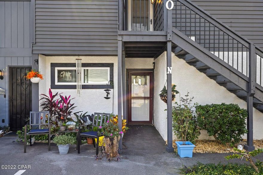 We love this condo! There are so many wonderful features to this unit! It is a ground floor unit, with a split bedroom plan that includes TWO master suites! The large, open living room has sliders that open to an amazing courtyard style side yard -- perfect for your pets! This unit will make a great short term rental! The complex has a wonderful pool area and nice parking area. The location is brilliant! It is only a block away from the lagoon, minutes away from the beach, shopping & St. Andrew's State Park. It is a sweet, smaller complex and the name ''Shade Tree'' fits perfect! Come see!