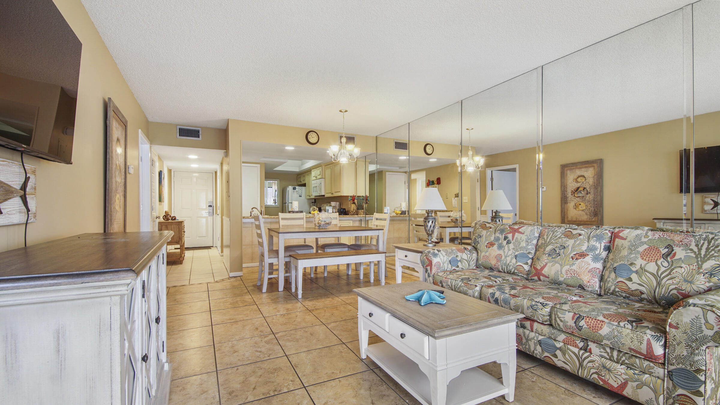 Experience coastal Living in golf Villa 925, a ground floor 1-bedroom 2-bath condo, with brand new furniture. This condo is spacious and serene. With fully equipped kitchen that is ideal for preparing delicious meals. And the spacious living area is optimal for hosting friends and entertaining. The bedroom offers ample space, making it perfect for unwinding and enjoying some alone time. and The en suite bathroom is complete with a double vanity. The condo comes equipped with two full bathrooms. The outdoor area includes a charming patio that overlooks a tranquil pond and fountain - the perfect place to relax and unwind. The villa has recently been painted and features wainscoting and tile flooring throughout.