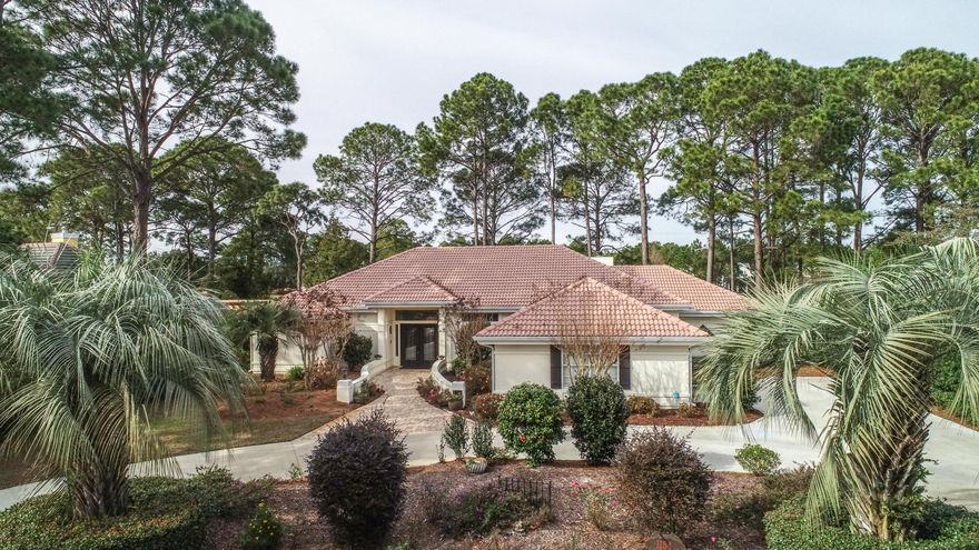 This beautiful 3 Large Bedroom home, plus office is a must see! Plenty of backyard space for a pool, Located on 18th hole of the Raven Golf Course in the private community of Sandestin Golf and Beach Resort. Open concept living at its finest, custom cabinets, oversized granite island, stone backsplash, unique stone gas fireplace in kitchen, hand scrapped tobacco wood floors. All new lighting and fans, Master bathroom has custom tile - floor to ceiling walk in shower - 7 shower heads, Crown molding, high ceilings, trifold sliding doors in dining room and master bedroom, Built in cabinets in family room, electric fireplace with stone surround. This entire home has been professionally renovated! New circular driveway, Italian barrel tile roof and lush vegetation. Brick paver walkway and rear patio. Flood Zone X. Low HOAs, walking/biking trails, close to park, back gate, Baytowne and Grand Blvd restaurants and shops, see the fireworks from your backyard. Comfortable easy living, golf cart to beach, golfing - close to Raven clubhouse, bay, pool, movies, live entertainment, restaurants, workout center/ Spa, tennis, marina, grocery and shopping. Call today to see this unique home.