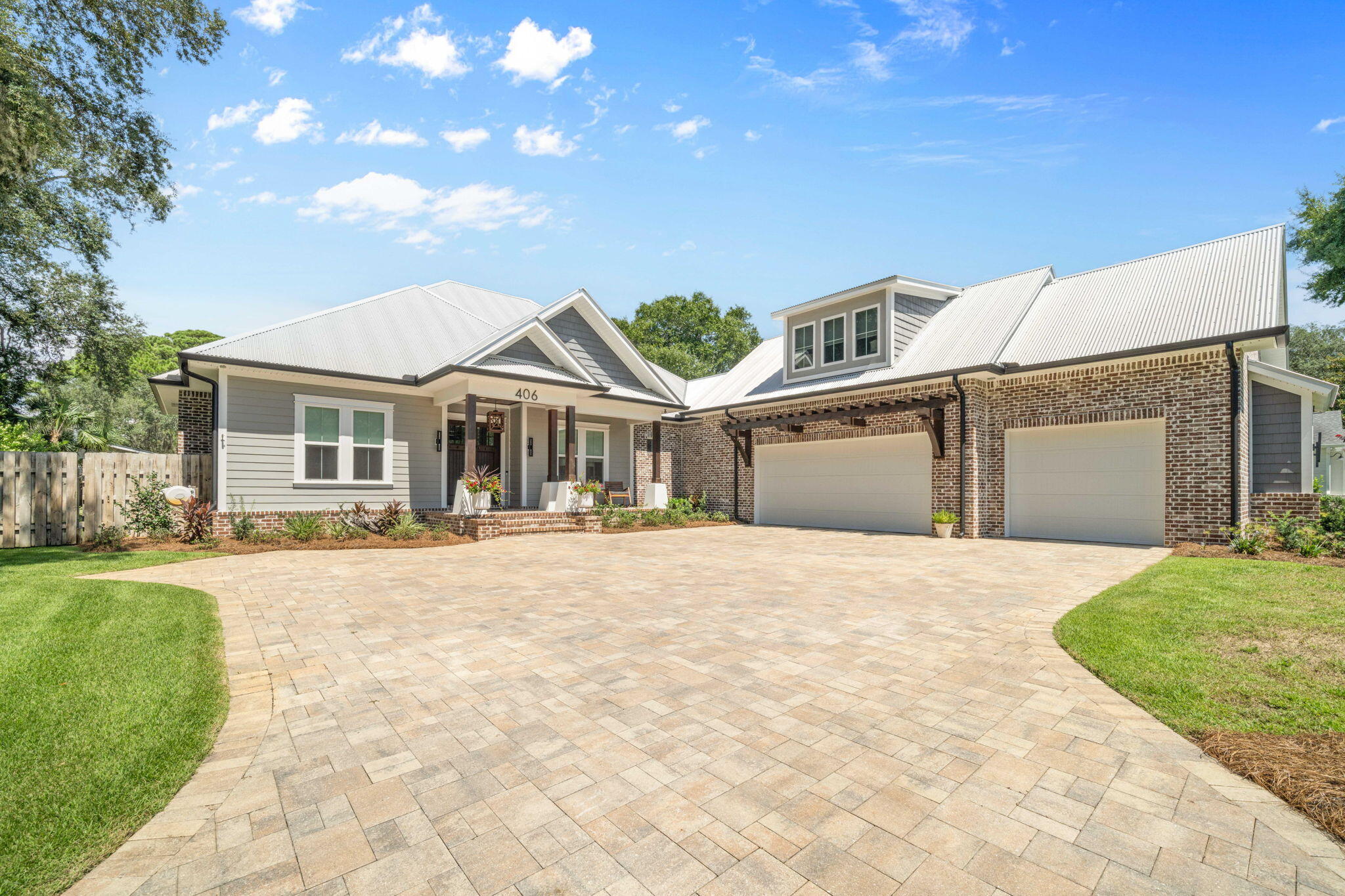 LOCATION, LOCATION, LOCATION!Welcome to 406 Bay Oaks Court - a rare gem in the heart of beautiful Destin, Florida. Nestled on a quiet cul-de-sac in Old Destin, just steps from Choctawhatchee Bay, this 2019 custom-built craftsman estate delivers the perfect blend of luxury, comfort, and thoughtful design.From the moment you step through the custom mahogany front door, you'll be captivated by the spacious, open-concept floor plan and the impeccable architectural details throughout. This 4-bedroom, 4-bathroom home also features a dedicated home office (easily used as a 5th bedroom), offering flexible living space! The chef's kitchen is a showstopper, boasting a professional-grade gas stove and oven, custom cabinetry, two built-in refrigerator/freezers, microwave drawer, and an oversized quartz island ideal for entertaining. The living area is equally impressive with coffered ceilings, a gas fireplace, and disappearing glass sliders that open up to your Florida dream lifestyle. The first-floor master suite features a geometric accent wall, dual walk-in closets with custom cabinetry, and a luxurious spa-like bathroom complete with dual shower heads, freestanding soaking tub, and backlit vanity mirrors. The second floor offers a large, private guest suite with its own full bathroom and independent Toshiba mini-split AC system, providing ultimate comfort and privacy. Step outside to your own private paradise. The centerpiece of the backyard is a custom gunite pool with a raised hot tub, surrounded by a pavered lanai perfect for year-round relaxation. Whether you're enjoying a morning swim or an evening soak under the stars, this outdoor space offers resort-style living at its finest. The screened-in porch with cedar tongue-and-groove ceiling, summer kitchen, and second gas fireplace creates the ultimate indoor/outdoor living experience. The backyard is fully fenced, beautifully landscaped, and features automated lighting, a lawn pump, and irrigation system to keep everything lush year-round. Massive 3-car side-entry garage with epoxy-finished showroom floors
Brick-paved driveway and 10' x 20' pavered parking pad with 30 AMP outlet for RV or boat
Metal roof, impact-resistant windows, spray foam insulation, and brick exterior for long-term durability and favorable insurance rates
Generac 22kW whole-house generator for uninterrupted comfort
LOMA-F designation in Flood Zone X
Situated in a private five-home neighborhood, you're within close proximity to Joe's Bayou boat launch, two waterfront parks, and the bustling Destin Harborwalk Village. Convenient to Eglin AFB, Hurlburt Field, top-rated schools, and just minutes from the world's most beautiful beaches.
