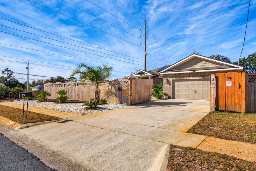 **PRICE IMPROVEMENT!!  INGROUND HEATED POOL & ELECTRICITY INCL!** This charming 4-bed/2-bath home on a corner lot showcases stunning features, including well-maintained landscaping in the front/ back yards! Inside, you'll find an inviting open floor plan with 10ft ceilings in the main living area and 9ft ceilings in other rooms. The kitchen features a central island with a breakfast bar, soft-close drawers, stainless steel appliances, quartz countertops, and upgraded vinyl plank flooring throughout. A washer/dryer are also included. Step outside to a screened back patio with a mounted TV and heated inground pool. Pool furn & service  provided along with an additional fenced side yard featuring artificial turf.  Owner allows a small adult dog (not exceeding 25 lbs) with non-ref fee.