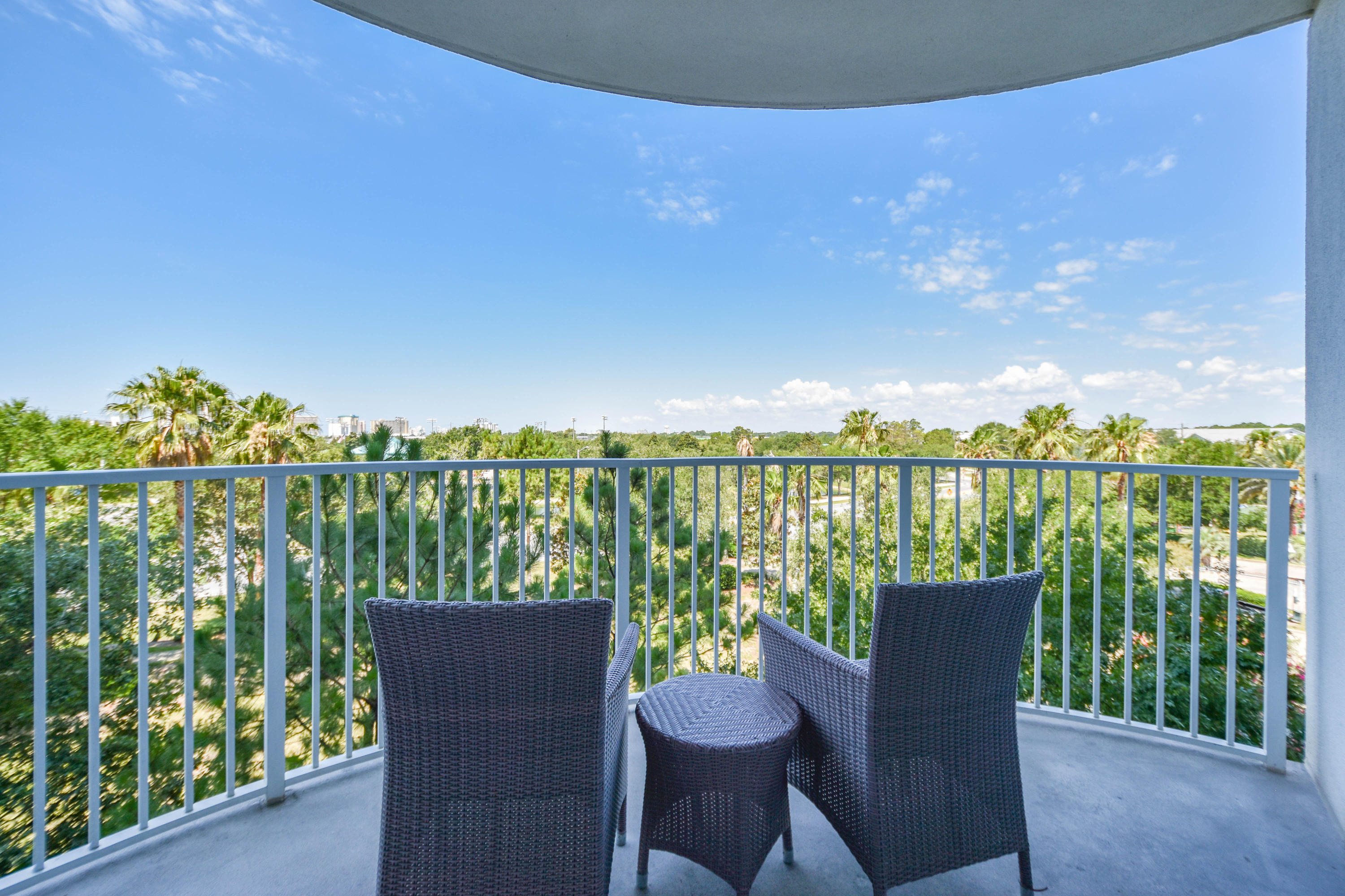 This westerly facing junior two-bedroom condo offers an open concept living and dining area, as well as an inviting large balcony. The lagoon pool and water features are the resort's crowning attractions. Onsite amenities include multiple pools with waterfall features, a hot tub, playground, fitness center, and tennis and basketball courts. Also, newly added, is an on-site restaurant offering lunch, dinner, room service and even in-season poolside service. Shuttle service to the June White Decker Public Beach access is offered in-season. All utilities are included in HOA dues water, sewer, electric, cable, WiFi, phone, trash! Excellent opportunity for a vacation rental, second or primary home.