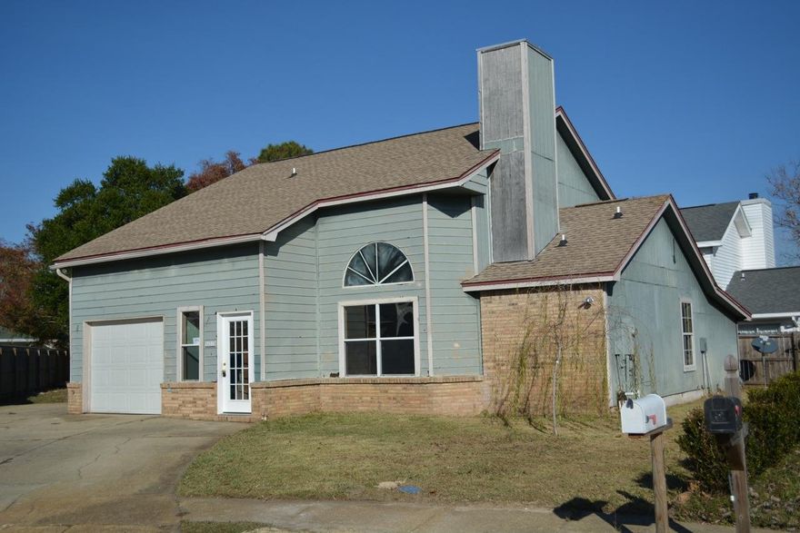 REO. Conveniently located in the central part of town, within walking distance to 3 schools and shopping - also convenient to both Eglin AFB and Hurlburt Field. This home features a Beautiful Brick Fireplace with Soaring Ceilings in the Living Area, Ceramic Tile in the Kitchen, 1st Floor Master Suite and a Large Kitchen. 2 Bedrooms and Full Bath Upstairs in addition to a small loft area.