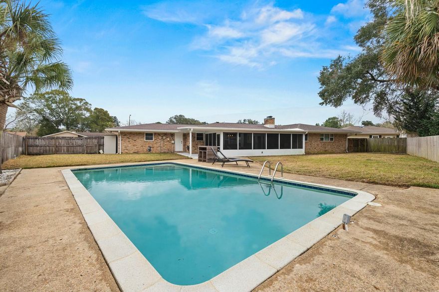 Don't miss this pool home with fantastic curb appeal located on a private court in the Kenwood neighborhood! With 4 bedrooms, 2.5 bathrooms, and all major systems updated, peace of mind abounds with this stunning home. Check out the feature sheet for an extensive list of upgrades to include a new roof, new HVAC, new wiring, new sunroom, new lawn pump, new pool pump, updated bathrooms, new water heater and more! Upon entering, you will find a flow through living and family room, wood burning fireplace, and a dining room adjacent to the kitchen. There is also a spacious pantry next to the kitchen where the laundry and half bathroom is also located. Enjoy sitting out back by the pool on your oversized screened in back porch year round! Make an appointment to see this wonderful home today!