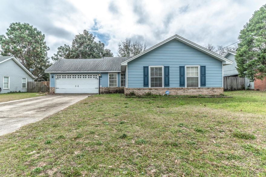 If you think you know this house... think again!! The owners recently had this home PROFESSIONALLY PAINTED, WITH BRAND NEW WOOD LAMINATE FLOORING INSTALLED! Welcome home to 9 Holly Road.. just 5 minutes away from the new elementary and middle schools, steps away from Okaloosa Medical Center, and a quick drive to the base. This 3 BR/2 Bath home offers NEW VINYL SIDING.. A NEW GAS WATER HEATER.. NEW STORM DOORS..NEW ECOBEE SMART THERMOSTAT, NEW KWIKSET DOOR LOCK/HANDLE, and the owners even replaced the AC unit, all kitchen appliances (GAS STOVE), and the roof. This 1500 sf home boasts a sunroom and a fully fenced backyard (privacy fencing). Priced LOW for a quick sale. PCS season is upon us.. make your appointment today!