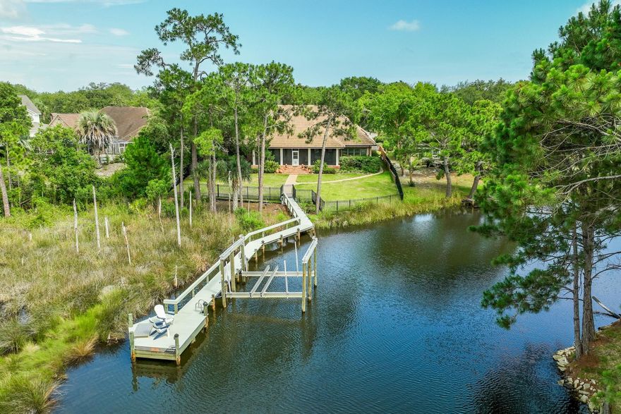 Welcome to your deep water oasis on Indian Bayou! This exquisite 4-bedroom, 3 and a half bathroom home has recently undergone extensive improvements, ensuring a luxurious and well maintained living experience. Starting with the exterior, the property boasts a brand-new concrete tile roof, complete with new gutters and skylights. The AC has been replaced throughout the home, including the addition of a dedicated A/C unit in the garage storage room. No more worrying about power outages thanks to the new 27KW Generac generator, ensuring uninterrupted comfort and convenience. Inside, you'll discover a host of impressive enhancements that include a newly renovated Kitchen and Master Bedroom Suite.