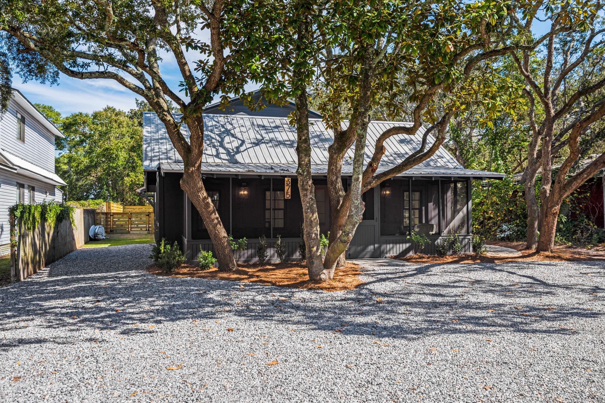 This historical 1953 Grayton Beach Cottage has been completely remodeled and expanded to maintain the old Florida charm with high end finishes. Upon entering Your greeted by 15 ft ceilings,  custom fireplace, 6 burner Wolf Range,Top of the line appliances, hand made Moroccan   zeleige tile, reclaimed oak floors throughout the house, custom cypress cabinets and much more. Upon entering you are greeted by a classic and timeless great room. With ample amount of space for entertaining guest. Accommodating over 6 bedrooms  with 2 master suites downstairs this home can be an ideal rental or secondary home.  Custom archways leading to a huge backyard with custom pool and hot tub. Located on the main road in grayton beach with walking  distance to world famous Red Bar and chiringo.