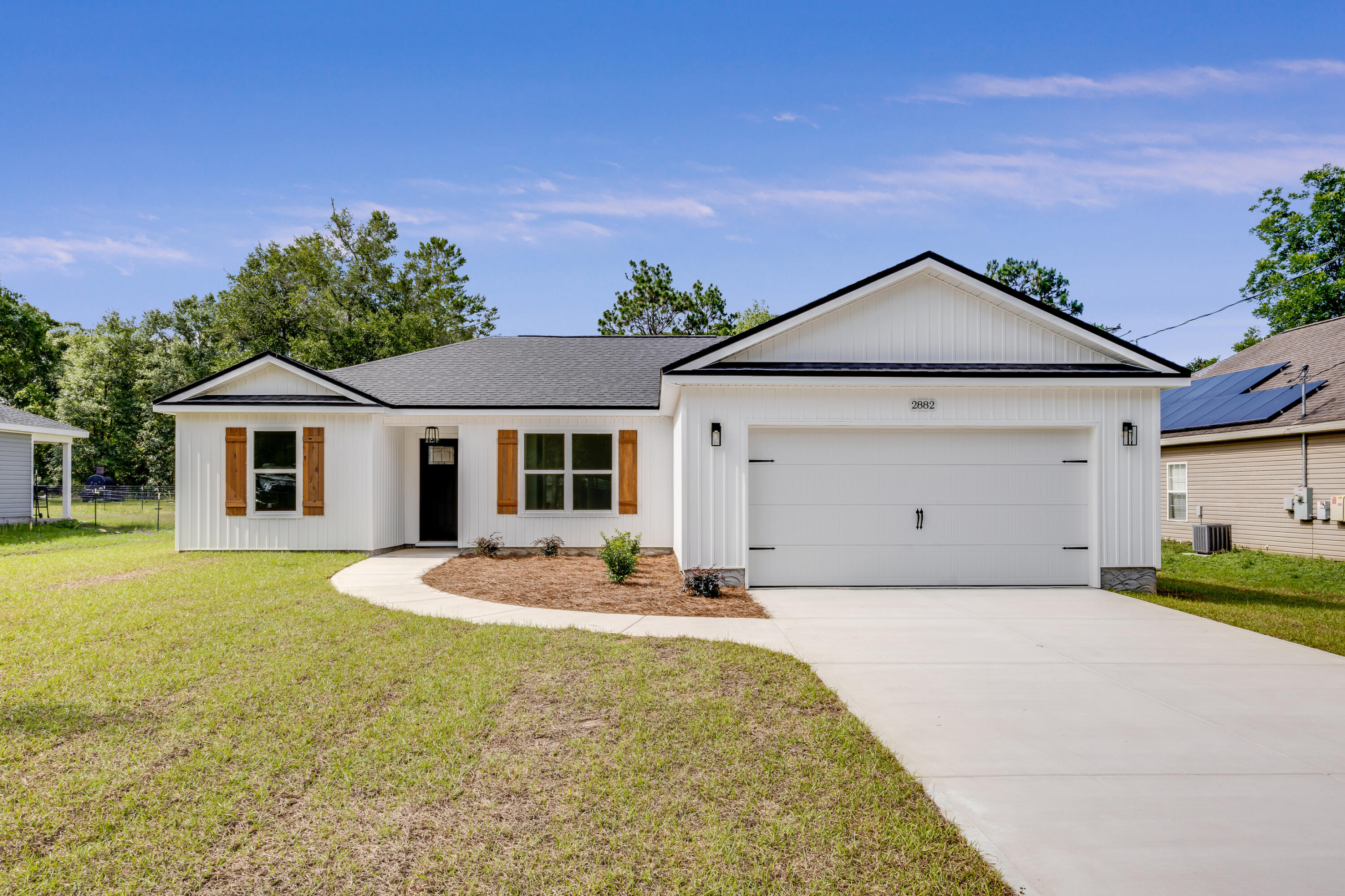 Come check out this beautiful custom-built home. The primary bedroom has a barn door, primary bathroom has a custom tile walk in shower, walk in closet and a double vanity sink with drawers, LVP flooring throughout, kitchen has quartz countertops with Whirlpool appliances. Beautiful contrasting tile backsplash with pot filler above stove. Two car garage with epoxied floor and a 7' x 10' back deck. Don't miss out on this opportunity. Call your favorite agent today!