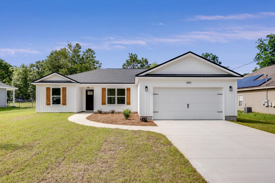 Come check out this beautiful custom-built home. The primary bedroom has a barn door, primary bathroom has a custom tile walk in shower, walk in closet and a double vanity sink with drawers, LVP flooring throughout, kitchen has quartz countertops with Whirlpool appliances. Beautiful contrasting tile backsplash with pot filler above stove. Two car garage with epoxied floor and a 7' x 10' back deck. Don't miss out on this opportunity. Call your favorite agent today!