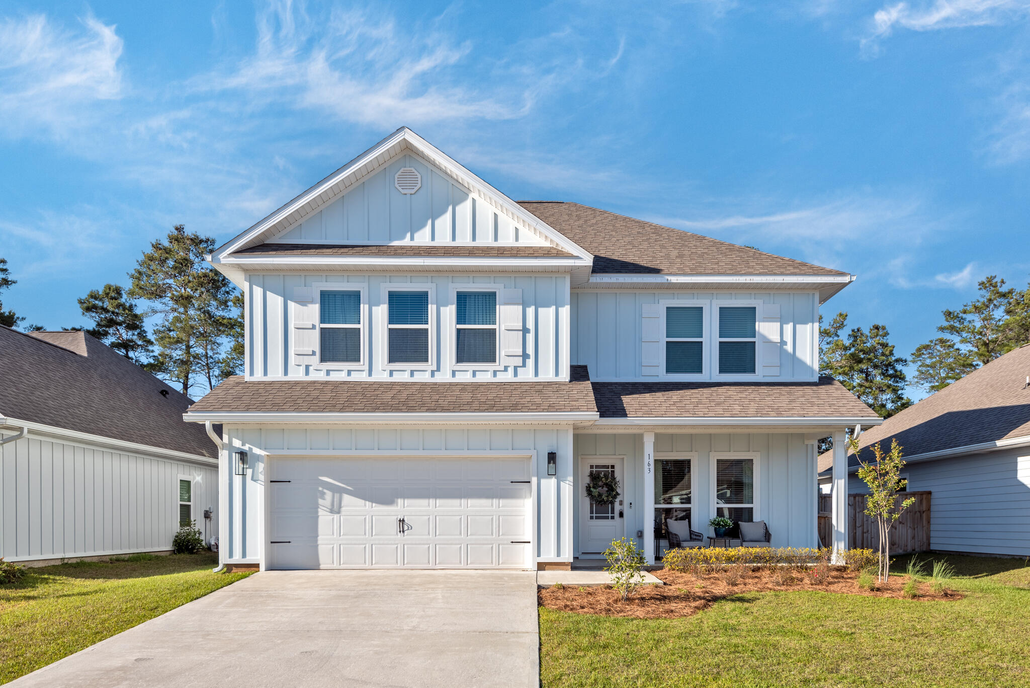 Find a welcoming design at this impeccably maintained 4BR/3.5BA home in the coveted community of the Preserve at Paradise Cove with nearly 2,500 square feet of thoughtfully planned living spaces. Upon entry, notice features such as 9'ceilings, EVP flooring throughout the home (no carpet!), and custom window treatments to convey with sale including blackout shades in bedrooms. The open living and dining space invites gathering while the modern kitchen offers stainless steel appliances, granite countertops, a center island with seating, and painted cabinetry. The first level master suite is a true retreat with a large closet and an ensuite with dual vanities and a tiled walk-in shower with bench. Upstairs, there are three bedrooms, two bathrooms, and a secondary living area. A screened back porch leads to the fenced backyard with a cozy fire pit area. Additional home highlights include a security system, whole-home water softener, a two-car garage, a floored attic, and an irrigation system. The Preserve at Paradise Cove is conveniently located to schools, shopping, dining, and the beach on the growing east end of South Walton.