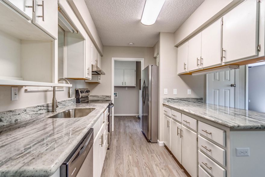 Beautifully Remodeled 3 bedroom 2 bath Home in Navarre. The Open floor plan makes this home perfect for living and entertaining. The Kitchen has newly painted White Cabinets, gorgeous Granite Countertops, and Stainless Steel Appliances. The Luxury Vinyl Plank Flooring in living and wet areas ensures low maintenance. This home is Move In Ready with New (2018) HVAC, newer Architectural Shingle Roof(2012), new vanities, flooring and much more! Enjoy entertaining in the screened in porch and HUGE Fenced in Yard with enough room for a pool, pet friendly and perfect for cookouts and family gatherings. There is a one car garage. Great neighborhood with lots of privacy and is minutes away from beautiful beaches, Hurlburt Field, A-rated schools, and other amenities. Schedule your tour today!