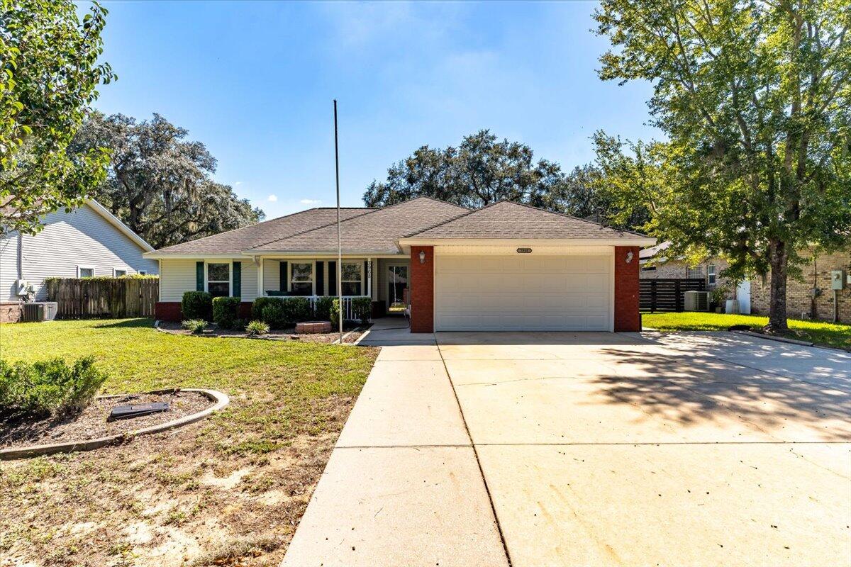 Welcome to 3968 Hickory Street, a charming family home nestled at the end of a tranquil cul-de-sac in the friendly community of Niceville, FL.  Located minutes from Eglin AFB and the world's most beautiful beaches, this home is perfect for those seeking a blend of convenience and leisure. This delightful 3-bedroom, 2-bathroom house is ideally positioned on a spacious .31-acre lot, offering both privacy and plenty of room for outdoor activities. The heart of this home is the open floor plan that seamlessly connects the living, dining, and kitchen areas, creating an inviting atmosphere perfect for family gatherings or entertaining guests. The tile and laminate flooring throughout the house provide a sleek, low-maintenance foundation for your personal style, while the surround sound system both inside and out sets the mood for any occasion. Cozy up by the fireplace on cooler evenings or enjoy the dining area that overlooks the covered pool, an ideal spot for year-round fun. The large kitchen is a chef's delight, featuring stainless appliances, a breakfast bar, and legacy maple cabinets that add warmth and character to the space. The master bedroom, complete with a tray ceiling and a walk-in closet, is a serene retreat, and the master bath offers the luxury of two separate vanities. Step outside to discover your enclosed pool, promising endless enjoyment for family and friends. With a pool pump that is approximately 2 months old and an auxiliary pump around 2 years old, peace of mind is part of the package. The HVAC system, about 8 years old, ensures your comfort in every season. A yard building conveys with the property, providing additional storage or workshop space. Don't miss out on this gem in Niceville, where comfort meets convenience in a picture-perfect setting. Sprinkler system and lawn pump in AS IS condition.  Buyer to verify items deemed important such as school zones, room sizes.  
