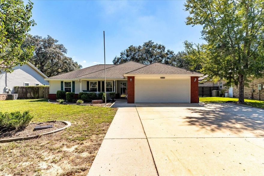 Under pending contract with a kick out clause. Welcome to 3968 Hickory Street, a charming family home nestled at the end of a tranquil cul-de-sac in the friendly community of Niceville, FL.  Located minutes from Eglin AFB and the world's most beautiful beaches, this home is perfect for those seeking a blend of convenience and leisure. This delightful 3-bedroom, 2-bathroom house is ideally positioned on a spacious .31-acre lot, offering both privacy and plenty of room for outdoor activities. The heart of this home is the open floor plan that seamlessly connects the living, dining, and kitchen areas, creating an inviting atmosphere perfect for family gatherings or entertaining guests. The tile and laminate flooring throughout the house provide a sleek, low-maintenance foundation for your personal style, while the surround sound system both inside and out sets the mood for any occasion. Cozy up by the fireplace on cooler evenings or enjoy the dining area that overlooks the covered pool, an ideal spot for year-round fun. The large kitchen is a chef's delight, featuring stainless appliances, a breakfast bar, and legacy maple cabinets that add warmth and character to the space. The master bedroom, complete with a tray ceiling and a walk-in closet, is a serene retreat, and the master bath offers the luxury of two separate vanities. Step outside to discover your enclosed pool, promising endless enjoyment for family and friends. With a pool pump that is approximately 2 months old and an auxiliary pump around 2 years old, peace of mind is part of the package. The HVAC system, about 8 years old, ensures your comfort in every season. A yard building conveys with the property, providing additional storage or workshop space. Don't miss out on this gem in Niceville, where comfort meets convenience in a picture-perfect setting. Sprinkler system and lawn pump in AS IS condition.  Buyer to verify items deemed important such as school zones, room sizes.  Pool liner has a leak and needs replacing.  
