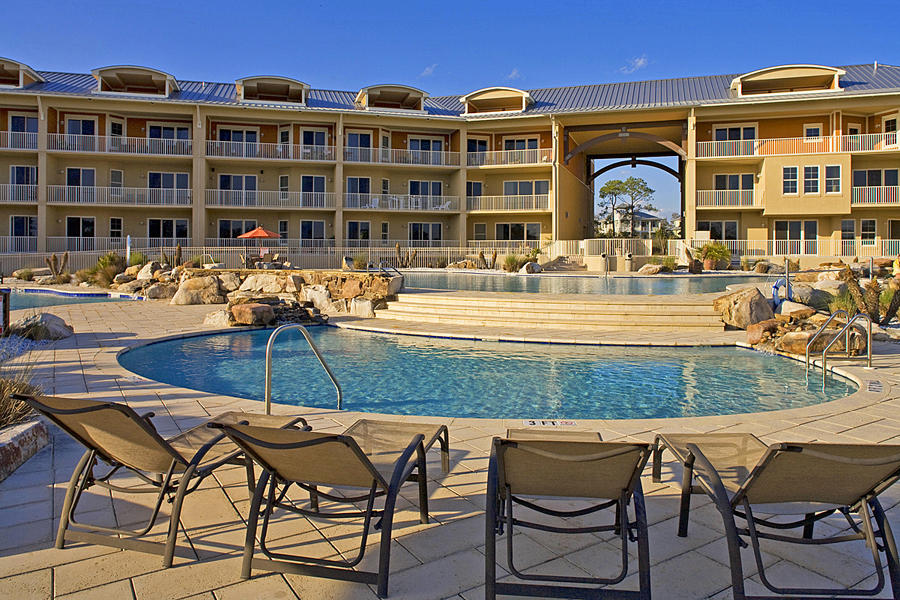 This luxurious 1st floor 3 bedroom - 3 and 1/2 bath unit is located in the highly desirable is priced to sell! Grayton Beach area's premier gated community south of Highway 30A. Located on 14 beautiful acres surrounding Big Redfish and overlooking the gulf. Features include Travertine throughout, 10 foot ceilings, granite, crown molding, a gas fireplace, expansive covered balconies and list goes on and on. Sanctuary at Redfish amenities include a state of the art fitness center, spa treatment room, walking trails, individual storage rooms and lockers and offers unparalleled privacy. Relax by the four large pools and listen to the soothing waterfalls that flow from the largest pool to the attached separate individual smaller pools. Two large hot tubs are located on both end