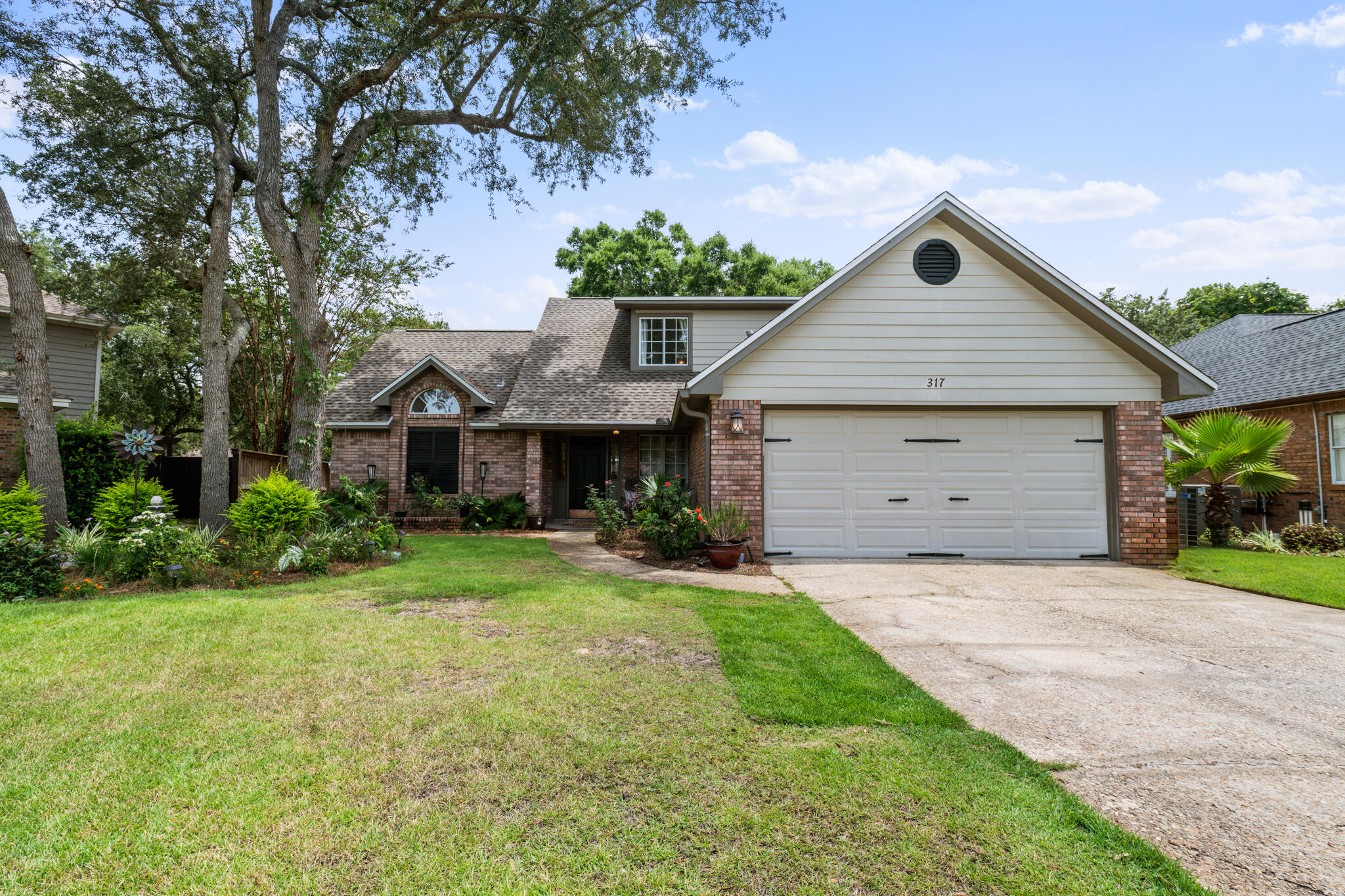 This home will ''wow'' you from the moment you walk in! You'll notice the grande staircase leading to the 3 bedrooms and full bathroom upstairs.  The master bedroom is on the 1st floor.  As you walk in to the right is a formal dining room currently being used as a playroom/spare kids room.  You'll appreciate all the gorgeous finishing touches throughout the whole house!  This home has been meticulously cared for!  The master bathroom suite features double vanities, his & her closets and a shower tub combo!  The kitchen boasts Quartzite countertops, stainless steel appliances and a gas stove and a breakfast nook!You'll LOVE the backyard where there's a lovely sitting area to enjoy nature or the kids playing!Schedule your showing today to see this one in person!