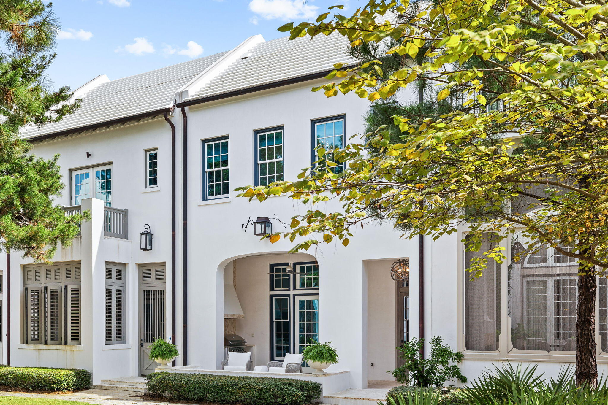 This beautifully designed courtyard home by Gary Justiss is brimming with architectural character and charm. Extra-high ceilings, a second-floor flex space and a coveted primary suite with a sitting nook raise the bar in this masterfully curated space. Perfectly positioned overlooking verdant Arboleda Park, the harmonious lifestyle is enhanced by the ever-present sound of cascading water. This stylish home is a lesson in luxury with Venetian plaster walls, beamed ceilings and tasteful decor creating a calming ambiance. The pristine white kitchen has a wall of French doors providing ample natural daylight and easy access onto the paved patio.