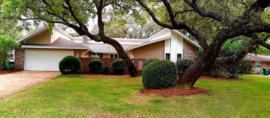 Not only is this single story, one-time homeowner in a super great location, home exudes so much charm and character. New roof (2017), new electrical panel (2019), new AC, new re-wiring, new hotwater heater. This beautiful home has partial view of the water.  Just a short golf cart ride to Shalimar Pointe Golf Course with 6 tennis courts. The beautiful mature oaks in both front and backyard feels more like a park. At entrance, you walk into a quaint courtyard with lovely bushes where you can enjoy your morning coffee at your bistro table. As you walk through the mahogany front door onto the hardwood floors, plantation shutters adorning the front windows, you step into the family living area. French doors across the back allows natural light throughout, opens onto the large screened porch.