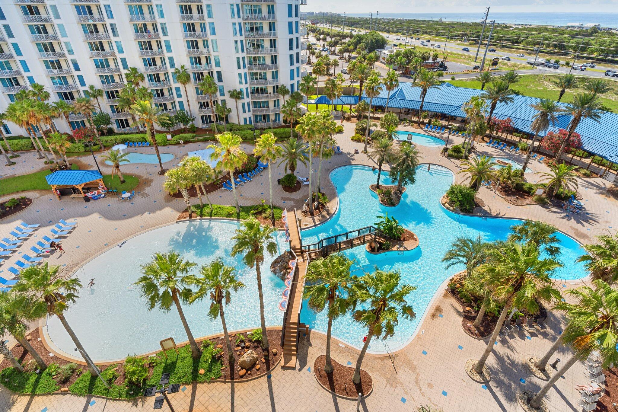 Welcome to your new Coastal Retreat! This condo features full 2-bedroom 2 bath located in south end of the tower. Zero walk-in lagoon size pool, splash pad and hot tub for your enjoyment. The gulf beaches are just a quick ride away with The Palms complimentary shuttle service. Or stay busy with the fitness center, gated children's playground, pickleball and basketball courts with complimentary court equipment. Food and refreshments are available at coffee bar, Bistro Bar, and Restaurants. Investors - this beautifully updated unit is a rental machine. Similar units have grossed $65K. New Hot Water Heater and HVAC 2023. New white shower, toilets and Vanity. Investors this is the turnkey unit you are looking for!!