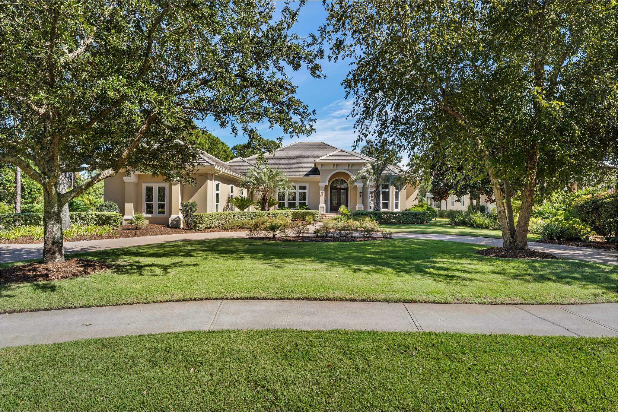 Influenced by Architecture of the Past and Inspired by Lifestyle of Today, We Welcome You to 4518 Marshbrook Way!  This Home's Location Offers Privacy & Exclusivity While Enjoying The Convenience Of Accessibility To The Owners' East Gated Entrance.  Allowing Swift Access To The Mid-Bay Bridge, Marina, Destin Commons & Less Than One Mile From Destin's Famous Beaches Of The Emerald Coast.  As You Stroll Down The Majestic Tree Lined Street You Will Find This Amazing Home Nestled Between Lush Landscaping Boosting Over 3/4 Of An Acre Bordered By The 6th Fairway & Attractive Natural Foliage On Three Sides Of This Private Enclave.  Upon Entering The Home You Will Be Greeted By Grand Mahogany Doors That Lead To A Large One Story Open Floor Plan.