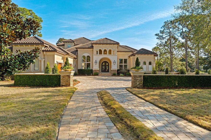 Step into a residence where refined design meets true entertaining luxury in the heart of Burnt Pine. From the moment you arrive, the home's striking curb appeal and beautifully manicured landscaping create an immediate sense of arrival. A spacious three-car garage offers ample room for vehicles, golf carts, and storage, while inside, the home unfolds with thoughtful design and elevated finishes throughout. Designed with both comfort and privacy in mind, every guest bedroom features its own en-suite bathroom--an exceptional detail that makes hosting family and friends effortless. Whether welcoming extended stays, holiday gatherings, or weekend guests, everyone enjoys their own private retreat while still feeling connected to the home's inviting flow. The primary suite is a true