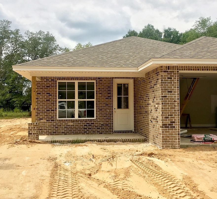 Beautiful, BRAND NEW 4 bedroom home located on a very large lot! EXTERIOR FEATURES: all brick exterior, fenced in back yard, 2 car garage with auto opener, irrigation system, full landscaping, large lot. INTERIOR FEATURES: foam insulation, 8' doors throughout, espresso cabinets, granite kitchen counter tops, marble bathroom vanity tops, recessed lighting, stainless steel kitchen appliances, tile in foyer/utility/bathrooms, carpet in bedrooms, laminate wood flooring in all other areas, large crown molding in main areas, large baseboard throughout, plenty of storage. OTHER FEATURES: A 1-yr builder warranty is provided, seller will pay a TOTAL of $4000.00 towards ALL closing cost (buyers & sellers), title & closing to be held with Tammy Jones at First National Land & Title.