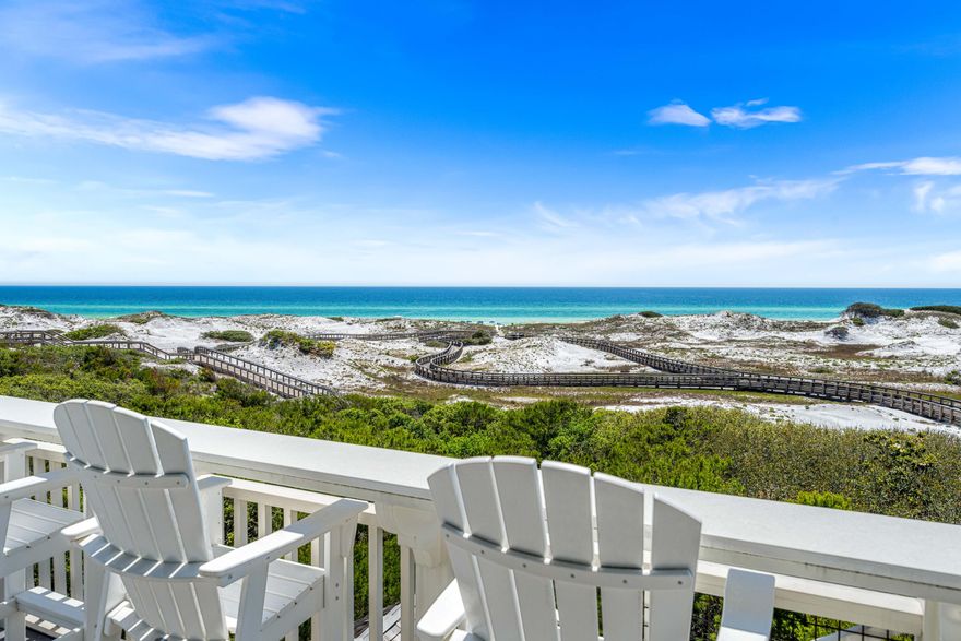 Positioned along the pristine shores of the premier WaterSound Beach community, this one-of-a-kind GULF FRONT haven presents the epitome of coastal elegance. A four-bedroom primary home and a two-bedroom guest house encompass nearly 6,200 square feet of impeccably designed interior spaces while a spacious outdoor courtyard offers a private pool, spa, and lounge area with firepit. From the moment you enter the residence, the meticulous quality of construction is apparent with luxurious finishes throughout including Venetian plaster walls, pecky cypress cabinetry and walls, custom millwork, beamed ceilings, brick accent walls, custom tiled bathrooms, hidden closets and so much more. The first level of the home offers the ultimate gathering space with a secondary living room with multiple seating areas, a gorgeous pecky cypress bar with Asko dishwasher, icemaker, and a Sub-Zero miniature refrigerator. There are also a guest suite with ensuite bathroom and a bunk room with four built-in bunks and an ensuite bathroom. Open and screened porches provide additional spaces to enjoy on the first floor.

Ascend to the second level via the custom staircase or elevator for added convenience. This grand space encompasses the primary living spaces with a gourmet kitchen, wine room, living room, dining room, and a spacious covered porch with summer kitchen and fireplace. Highlights of the kitchen include marble counters, custom cabinetry, a Cove dishwasher, Wolf gas range with hood, and Sub-Zero refrigerator and freezer while the wine room offers built-in storage, a Sub-Zero wine fridge, beverage center and icemaker. An elegant guest suite with ensuite bathroom is also located on the second floor plus a powder room. Connected to the main house via a unique glass catwalk is the sizable guest home. It includes a sitting area, two bedrooms and a full bathroom.

On the third level, find the primary suite with spectacular views across the breathtaking natural sand dunes of WaterSound Beach. A separate sitting area, pecky cypress walls, incredible ensuite which includes a television in the mirror, built-in office, morning bar with Sub-Zero wine refrigerator and icemaker, and private porch with gulf views make this a truly luxurious owner's retreat. On the top floor, find the crowned jewel with a cozy sitting area with pecky cypress walls and ceilings and exterior porch all with magnificent Gulf views.

Follow a wooden boardwalk winding through picturesque dunescape directly to the beach from this residence. Outstanding community amenities including swimming pools, a puttering park, community green space, and a state-of-the-art fitness center are steps away. This stunning gulf-front home is a masterpiece of design, seamlessly blending modern sophistication with the natural beauty that defines the 30A Gulf Coast and offers a one-of-a-kind opportunity for the most discerning buyers.
