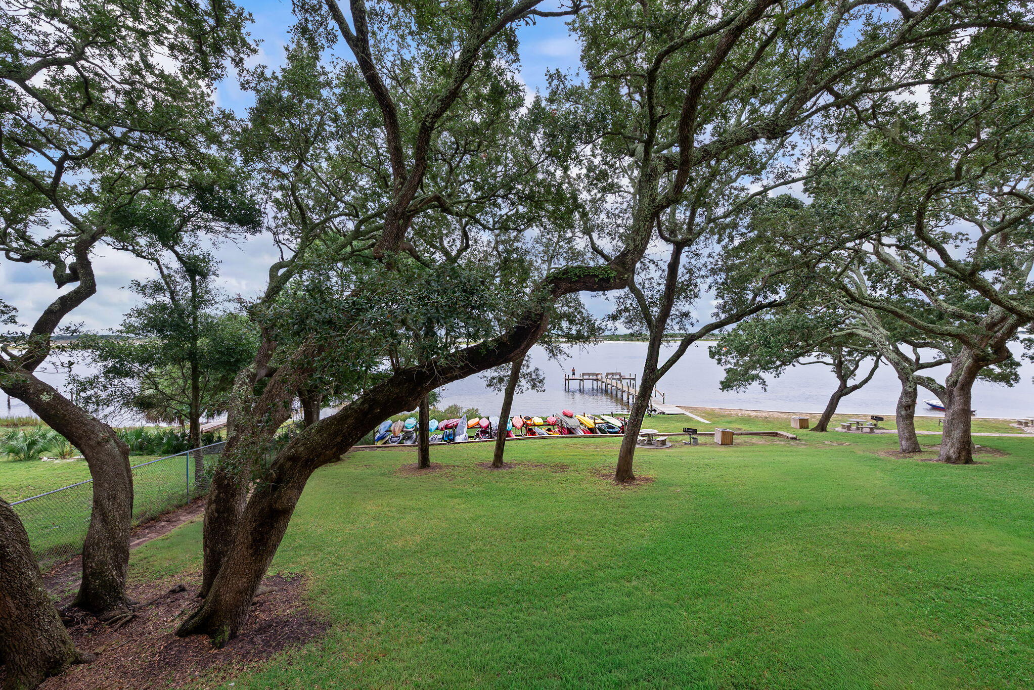 This is a water front unit. Enjoy your little piece of paradise at The Ceder's! Waterfront Florida living at a great price! You'll have access to a beautiful pool, private beach, boat dock, BBQ grills, kayak racks and a serene courtyard all situated in a wonderful location just minutes from the bases, and the beautiful beaches of the Gulf of America and shopping. This is a great opportunity to call home OR your home away from home.