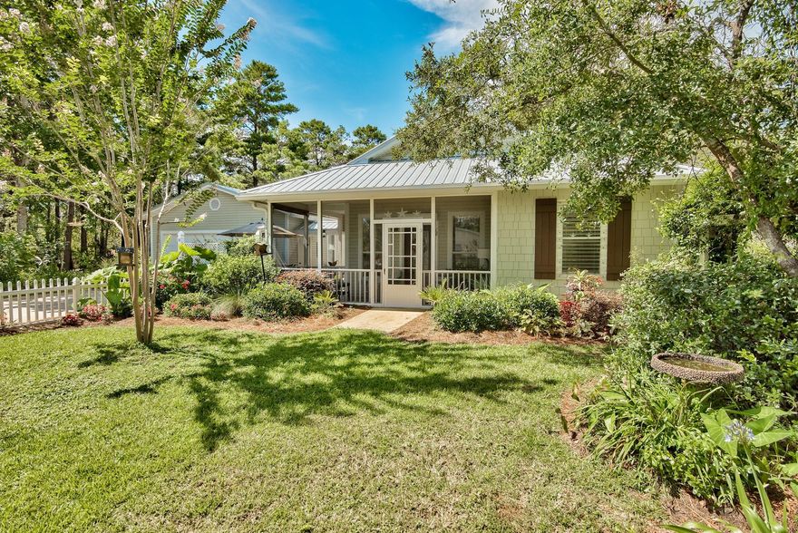 Framed by a white picket fence, this charming beach bungalow offers privacy and rare, oversized, heated and cooled two car garage with separate finished studio. The home has three full bedrooms and two and one half baths, with a screened, tiled porch. Master, guest, and half baths are all updated, as is the kitchen. The finished studio offers many possibilities. The Fully fenced yard has a gate to Point Washington State Forest. Outdoor areas include a patio for dining and fire pit in rear yard. Full facility beach access at Gulfview Heights is a short golf cart ride away. Metal Roof 2017; Electric Heat Pump 2011; Mitsubishi Split system HVAC Garage/Studio 2012. Water Heater 2017. Termite Bond. Kevlar Hurricane Shutters. Full house and garage alarm system. This house has it all! Studio Square Footage is included in SF Notation above.    Seller is awaiting written letter from Walton County Property Appraiser that this is included square footage.  