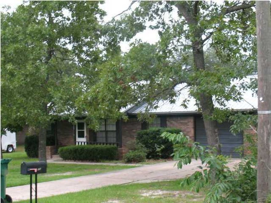 GREAT LOCATION! LOCATED SOUTH OF I-10 AND CONVENIENT TO EVERYTHING! THIS IS A 3BR/2B, 1276 SF ALL BRICK HOME W/LARGE SCREENED BACK PORCH & FRONT PORCH. Tile at foyer, baths & kitchen/dining, baths & newer bath vanities, lights, mirrors & faucets installed. Stove, refrigerator & dishwasher are furnished. Split bedroom plan. Large walk-in closet in master bath. Large privacy fenced back yard w/outside shed. THIS HOME IS BEING SOLD AS IS BEFORE WORK DONE!!