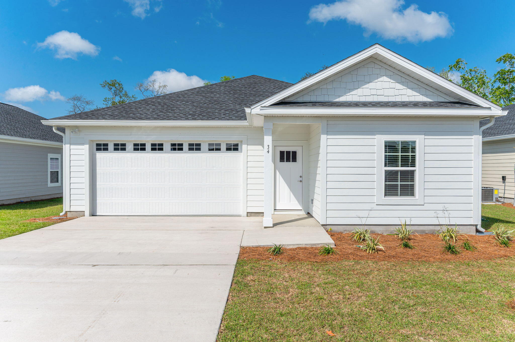 Presenting an exceptional opportunity to own a newly constructed home in the sought after Riverwalk community, known for its charming ambiance and prime location! This coastal inspired gem combines modern design with functional living. Exterior of home features a sprinkler system, fiber cement hardie plank siding that provides both aesthetic appeal and durability and a finished 2-car garage ensuring ample storage space. Step inside to discover an open concept floor plan with 9' ceilings allowing for a seamless flow between living, dining, and kitchen areas. This home boost luxury vinyl plank flooring, quartz countertops, white shaker cabinets, and stainless steel appliances. Enjoy the upcoming summer months with access to the community clubhouse with pool and fitness center.