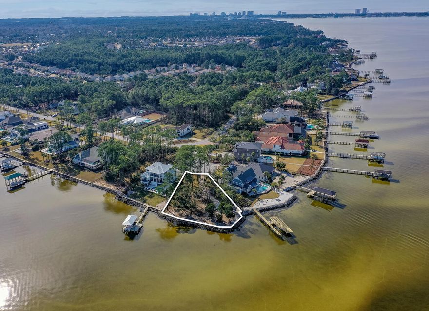 Boating for a day of relaxation or catching redfish from this peninsula waterfront Lot on the Choctawhatchee Bay, this lot offers up the ultimate spot for a truly luxury, yet quiet lifestyle to build your dream home.  Situated on a half-acre at the tip of a quiet cul de sac in Driftwood Estates, this bayfront lot can accommodate a 10,000 square foot home to be built.  With an incredible span of 204ft of beautiful bayfront,  you will be captivated with  the sunset from many angles  that will indeed delight the senses.  Rock ballast was added to the seawall in 2021.  Come out and see for yourself and build your dream! Lot Features
212 feet and rock ballast added to the seawall in 2021
Sunset and Sunrise views
Survey indicate buildable area as 11,038