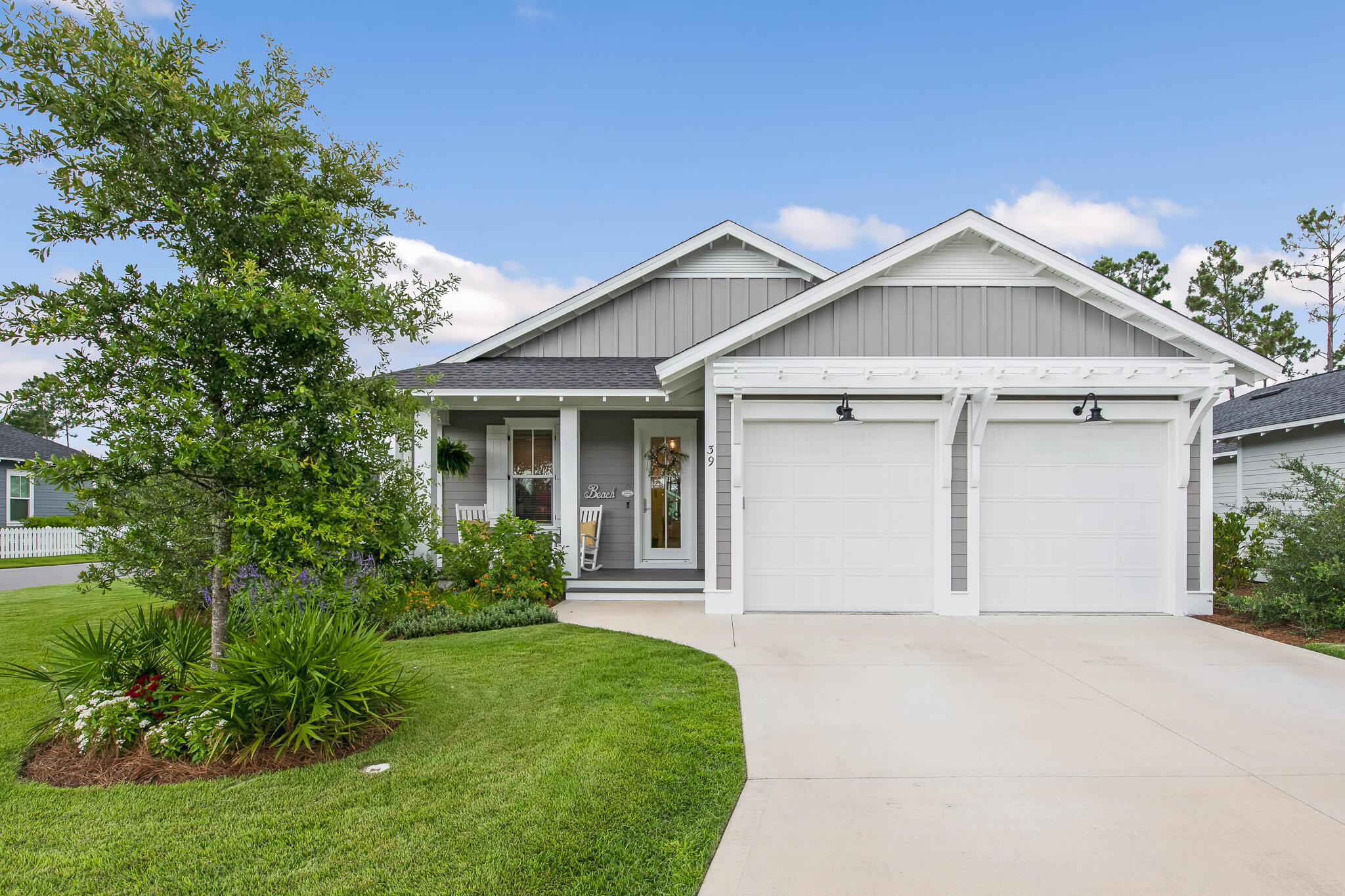 Look no further than this gorgeous like new 2 year old home that sits on a premium corner lot on one of the only dead end streets in Watersound Origins. This coveted back street of Pathways offers unobstructed water and forest views to the east. Take a short walk following the path directly behind the house to the community pavilion to enjoy golf, tennis, pickleball, swimming or the workout facility. No through traffic and the idyllic sound of nature set this location and house apart from the rest.  Mix things up you can go to the community dock on Lake Powell where you can paddle board, kayak and fish. Or take the 2.5 mile bike path to enjoy all that Scenic Hwy 30A has to offer.