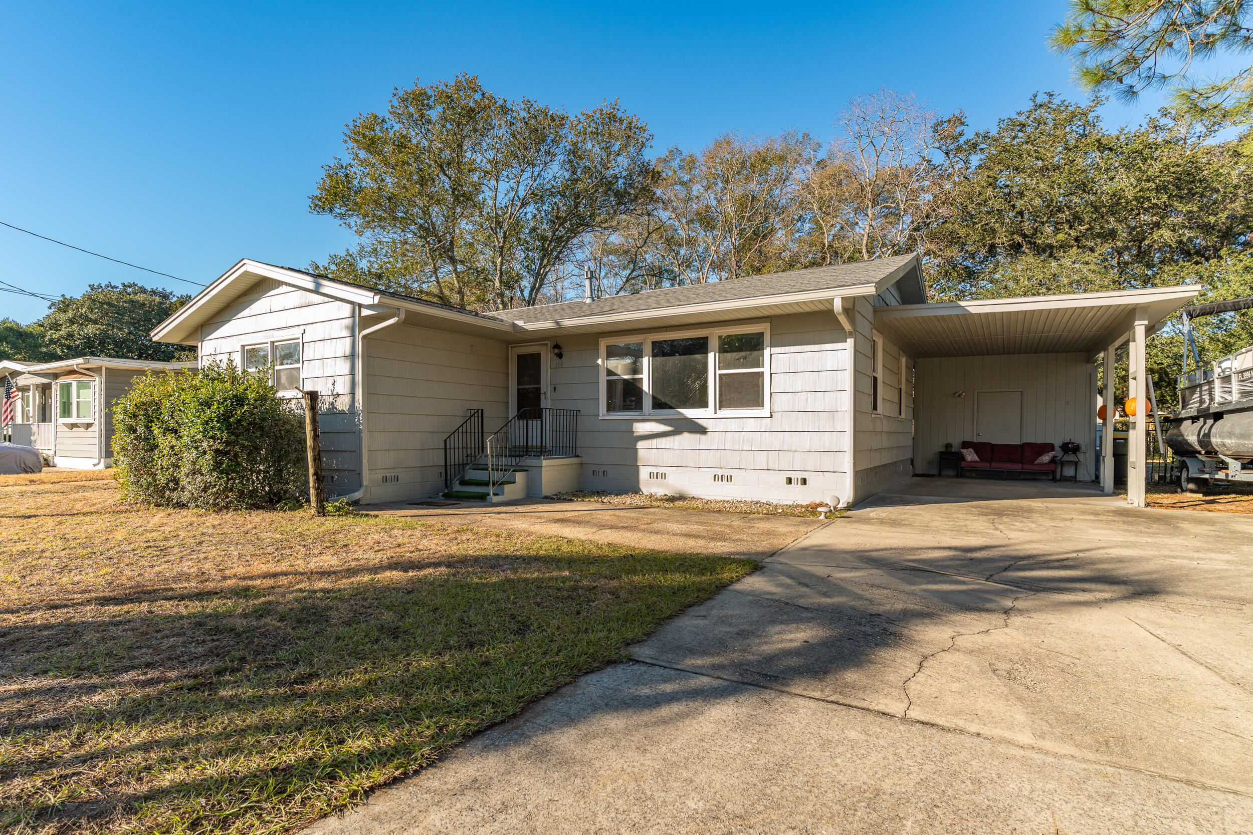 The perfect investment property! Discover this unique 4-bedroom, 2-bathroom home in Fort Walton Beach, FL, situated on a spacious 0.25-acre level lot. Featuring a versatile floor plan, this home offers two separate living spaces under one roof, providing flexibility and privacy. The main section of the home is accessible from both the front and back doors and includes a generous living room, dining area, kitchen with pantry, a master bedroom with his-and-hers closets, a full bathroom, and two additional bedrooms. Bedroom three conveniently connects to a hallway leading to the second living area. The second living space has its own private entry and exit, offering a full kitchen, living room, bedroom, and full bathroomideal for accommodating aging family members while maintaining independence or as a potential rental income opportunity.
Additional features of this property include a covered carport, utility room, yard building, and an oversized driveway with ample parking. The home is equipped with a durable dimensional shingle roof with gutters and a lawn pump for irrigation.
With endless possibilities, this property is ready for your personal touchmake it yours today!

