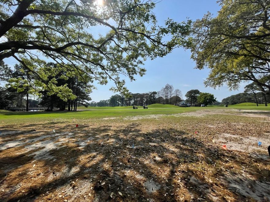 Oversized corner lot in the highly sought after neighborhood of Troon Drive located within the gates of Sandestin Golf and Beach Resort. This beautiful golf course perched lot overlooks the 18th Fairway of Baytowne Golf Course and also features views of the lake. Don't miss this rare opportunity for the perfect dream home site. Sandestin Golf and Beach Resort features more than seven miles of beaches and pristine bay front, four championship golf courses, 15 world-class tennis courts, a 226-slip marina, a fitness center, spa and celebrity chef dining. Shop, dine and play at the charming pedestrian village. Everything within the gates of the resort is accessible by golf cart or bicycle. The entire resort is interconnected by miles of pedestrian, bike and golf cart paths that weave through groves of live oaks, meandering past natural lagoons, fountains, man-made lakes, and meticulously landscaped fairways.