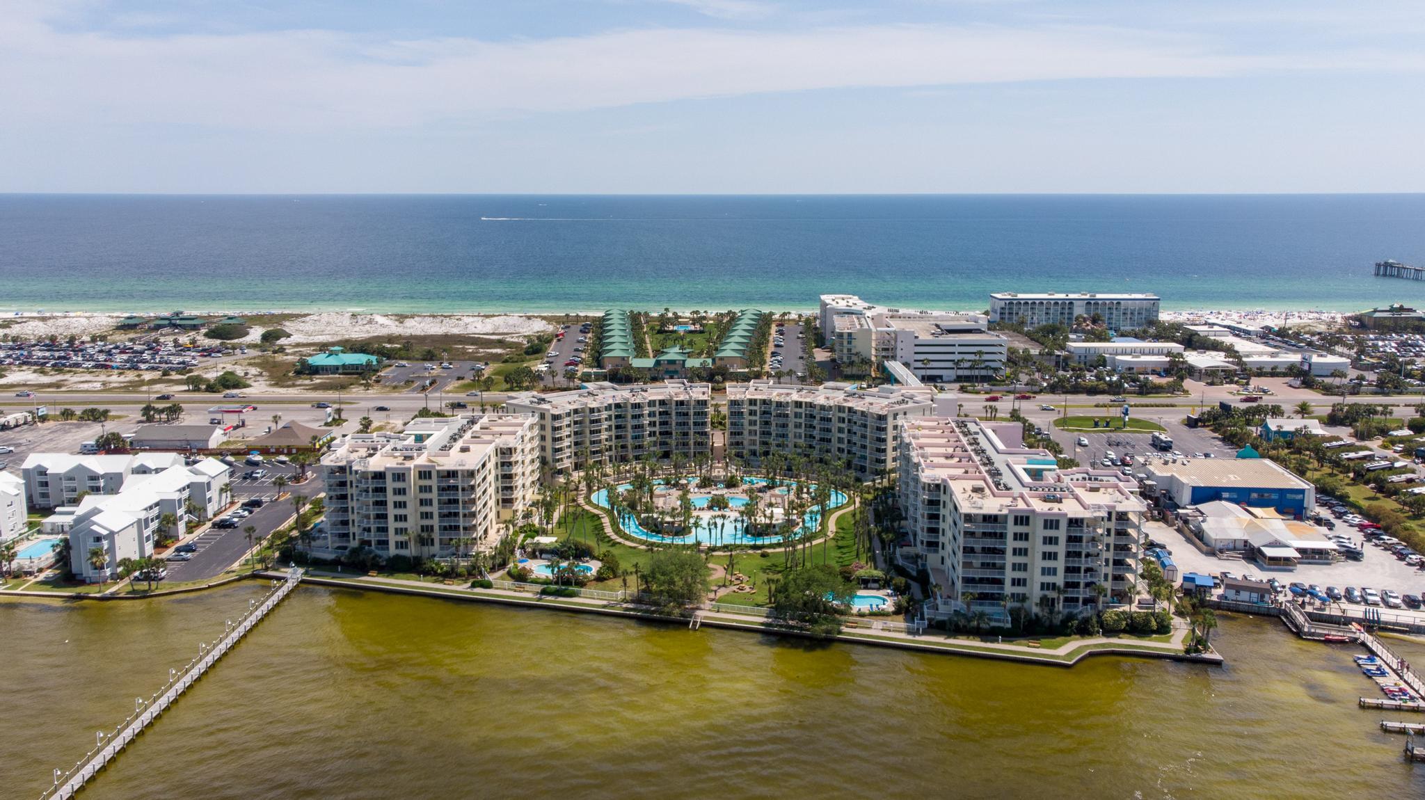 Don't miss your chance to discover the beauty of the Emerald Coast! Situated on Okaloosa Island with choice views, Destin West puts all of the area's best attractions only minutes away from your vacation home. From fishing, to golfing, to swimming, this resort has something for everyone. It features a lazy river, seven pools, a fitness center, a Sky Bridge for easy access to the Gulf, and beach rental service. From this updated bay side unit, you can enjoy the spectacular views from the balcony, easily access the lazy river and pool area, and take a short, safe walk to the Gulf over the Sky Bridge. This unit has incredible rental history grossing $46,446 in 2019 and $44,590 in 2020. The turnkey unit features a beautiful view from the balcony, sleeps 8 guests, and a spacious living are